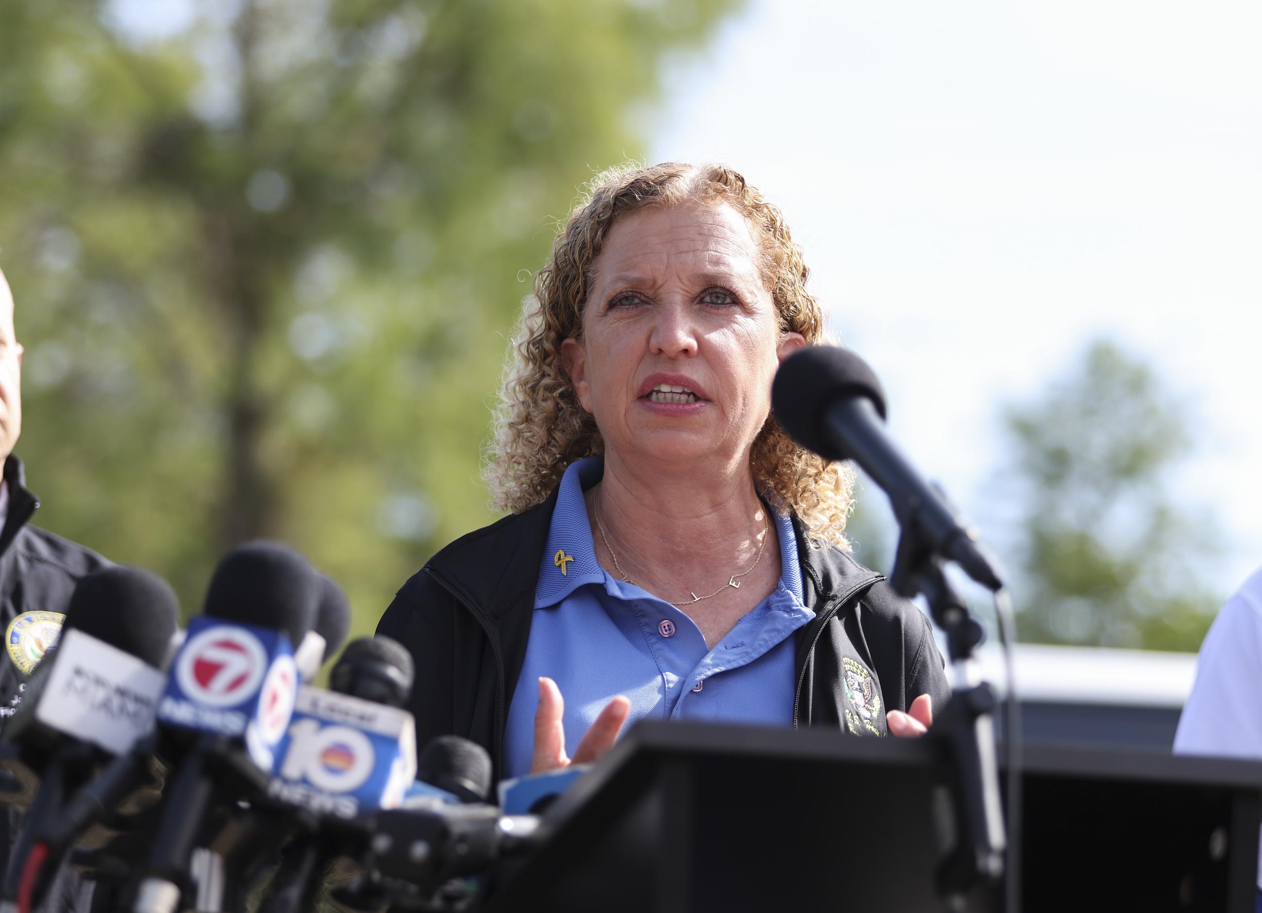 Rep. Debbie Wasserman Schultz speaks outside the migrant detention facility dubbed "Alligator Alcatraz" during a news conference ahead of a tour of the Dade-Collier Training and Transition Facility, Saturday, July 12, 2025, in Ochopee, Fla. (AP Photo/Alexandra Rodriguez)