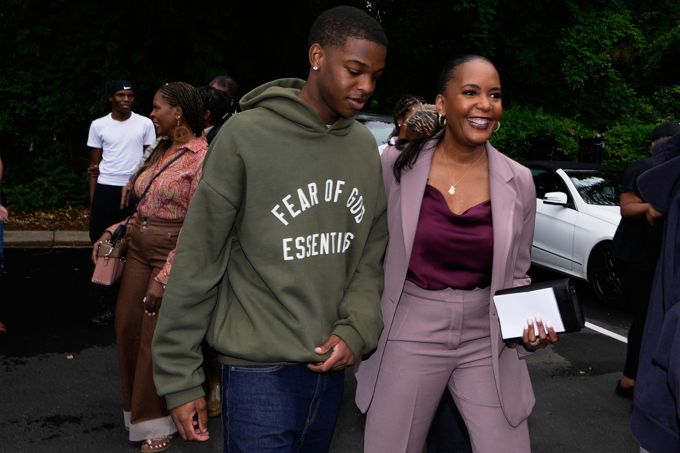 Democratic candidate for Georgia governor Keisha Lance Bottoms walks to vote early with her son, Langston Bottoms, in the primary election on May 7 in Atlanta. (AP Photo/Brynn Anderson)