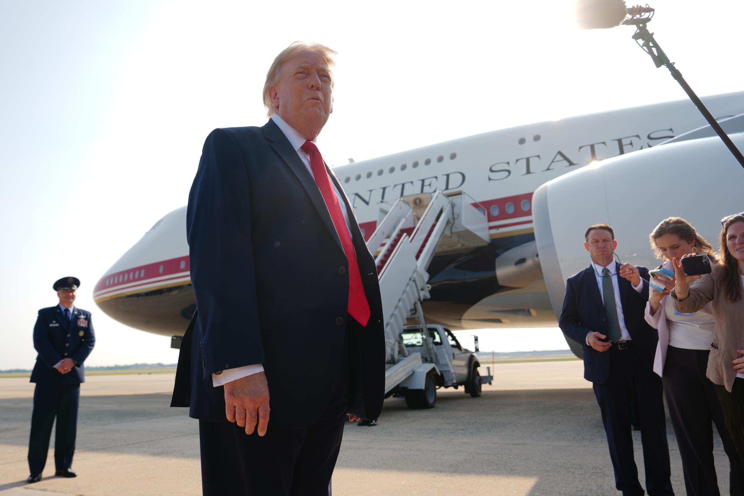 President Donald Trump speaks to reporters before boarding Air Force One, Wednesday, July 1, 2026, at Joint Base Andrews, Md. (AP Photo/Julia Demaree Nikhinson)