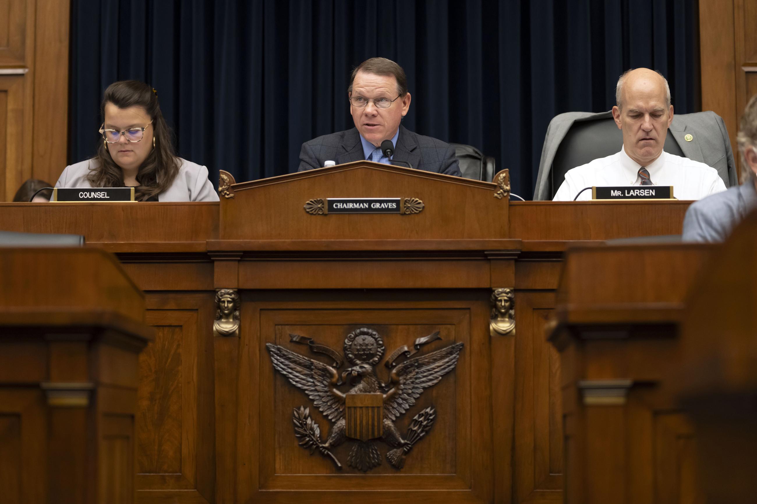 House Transportation and Infrastructure Committee Chairman Sam Graves (center) and ranking member Rick Larsen (right) at a committee meeting in 2023 (AP Photo/Mark Schiefelbein)