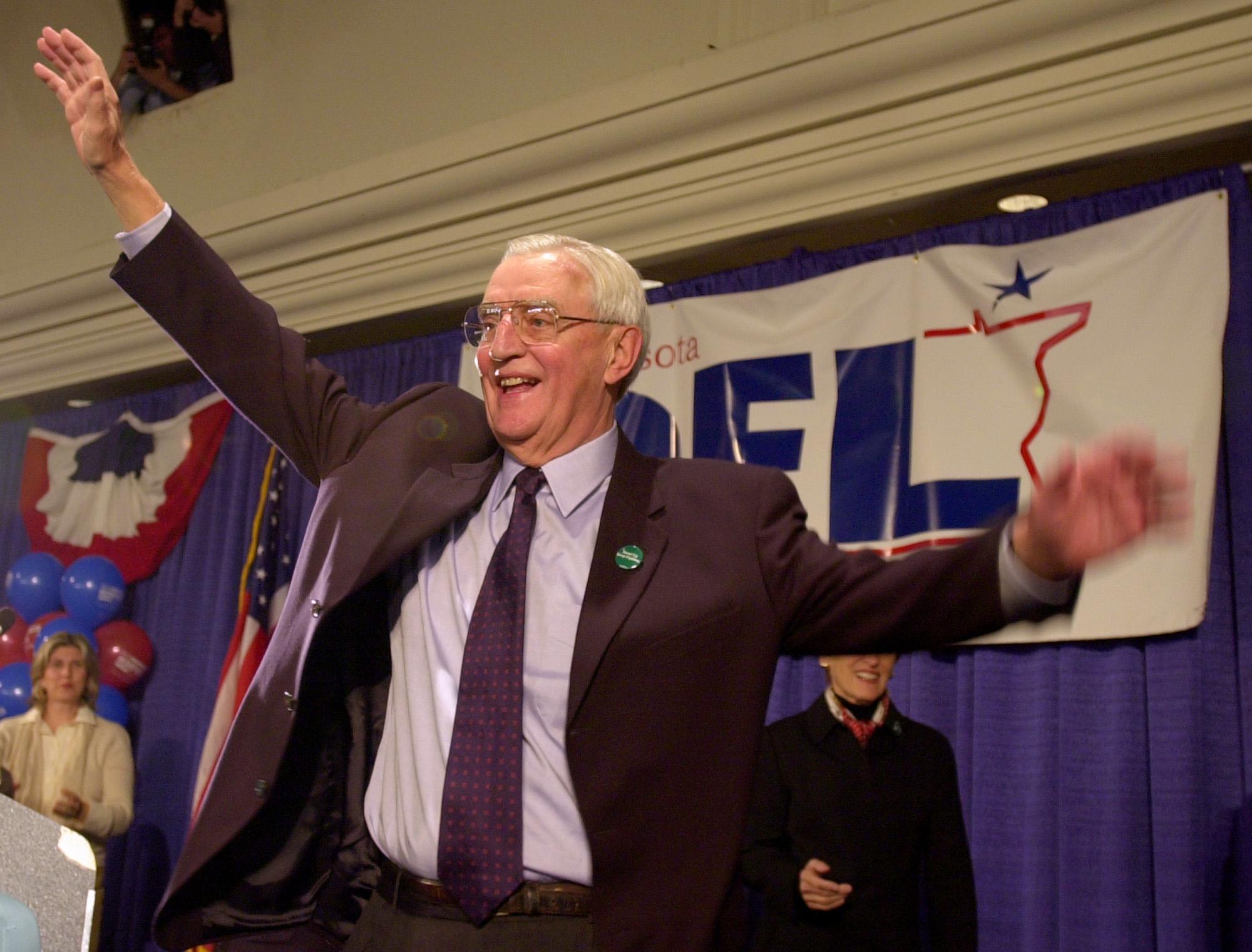 Former Vice President Walter Mondale waves to his supporters after addressing the crowd at his election night headquarters late Tuesday night, Nov. 5, 2002 in St Paul, Minn. Mondale is running against Republican Norm Coleman for the seat of the late Sen. Paul Wellstone, who died in an airplane crash more than a week ago. (AP Photo/Stephan Savoia)