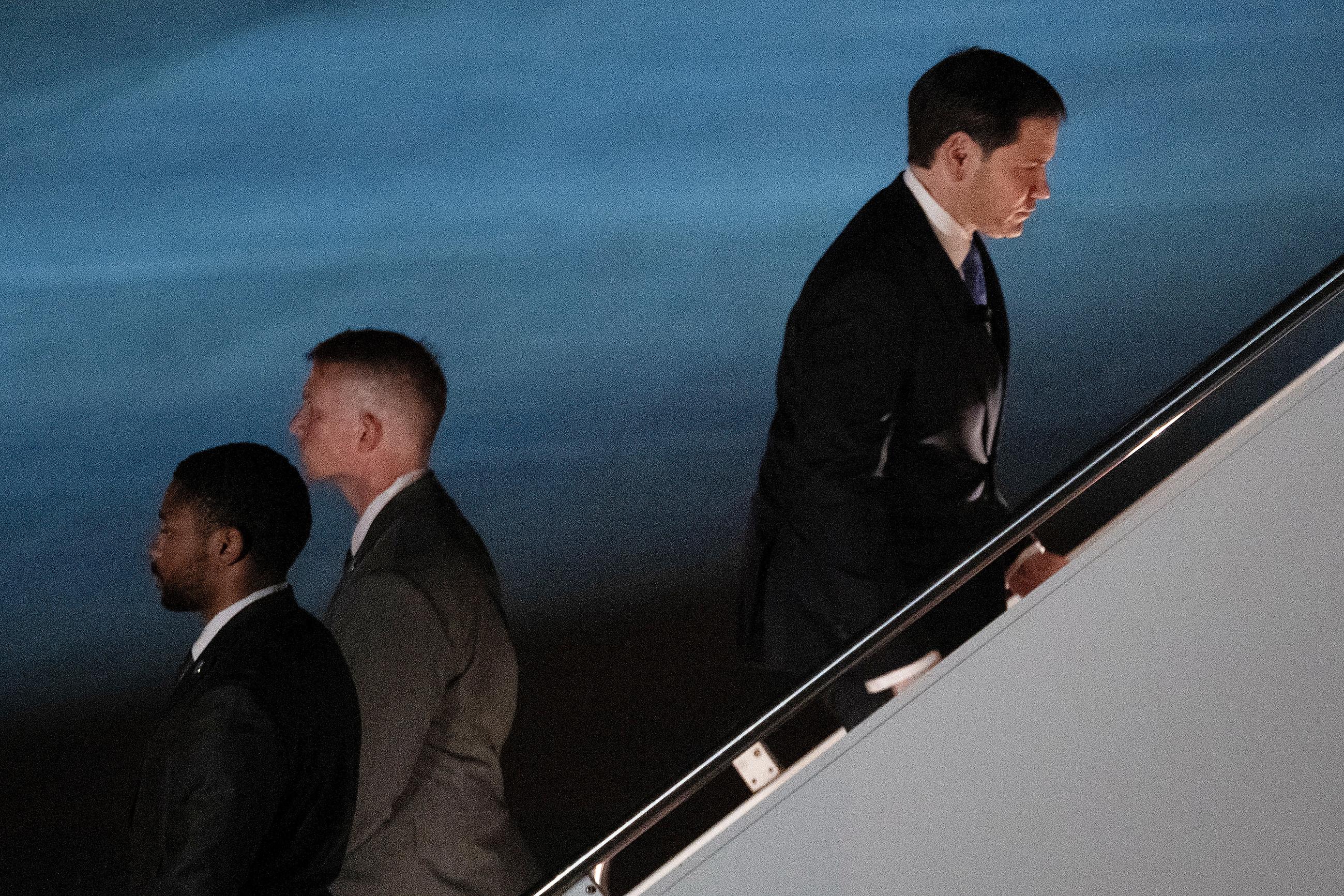 Secretary of State Marco Rubio boards his plane before departing Joint Base Andrews, Md., on Sunday, en route to Manila, Philippines, to attend the 59th ASEAN Foreign Ministers' Meeting. (Brendan Smialowski, Pool via AP)