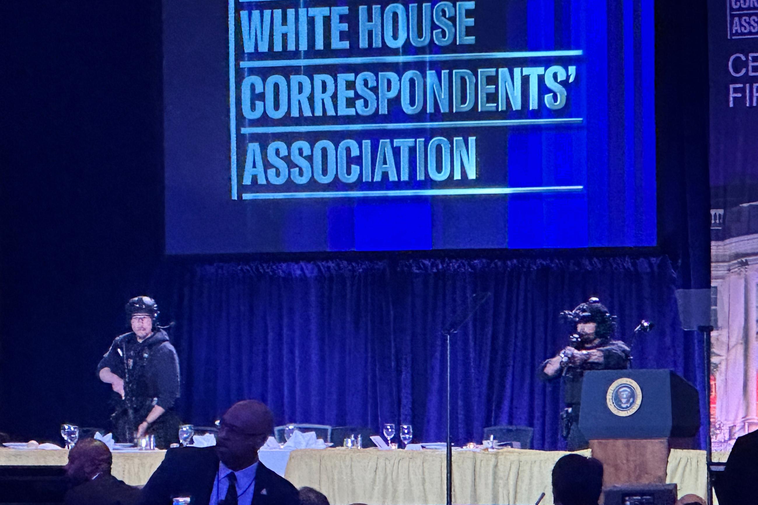 U.S. Secret Service agents respond on stage during the disruption at the White House Correspondents' Association Dinner on April 25. (AP Photo/Alex Brandon)