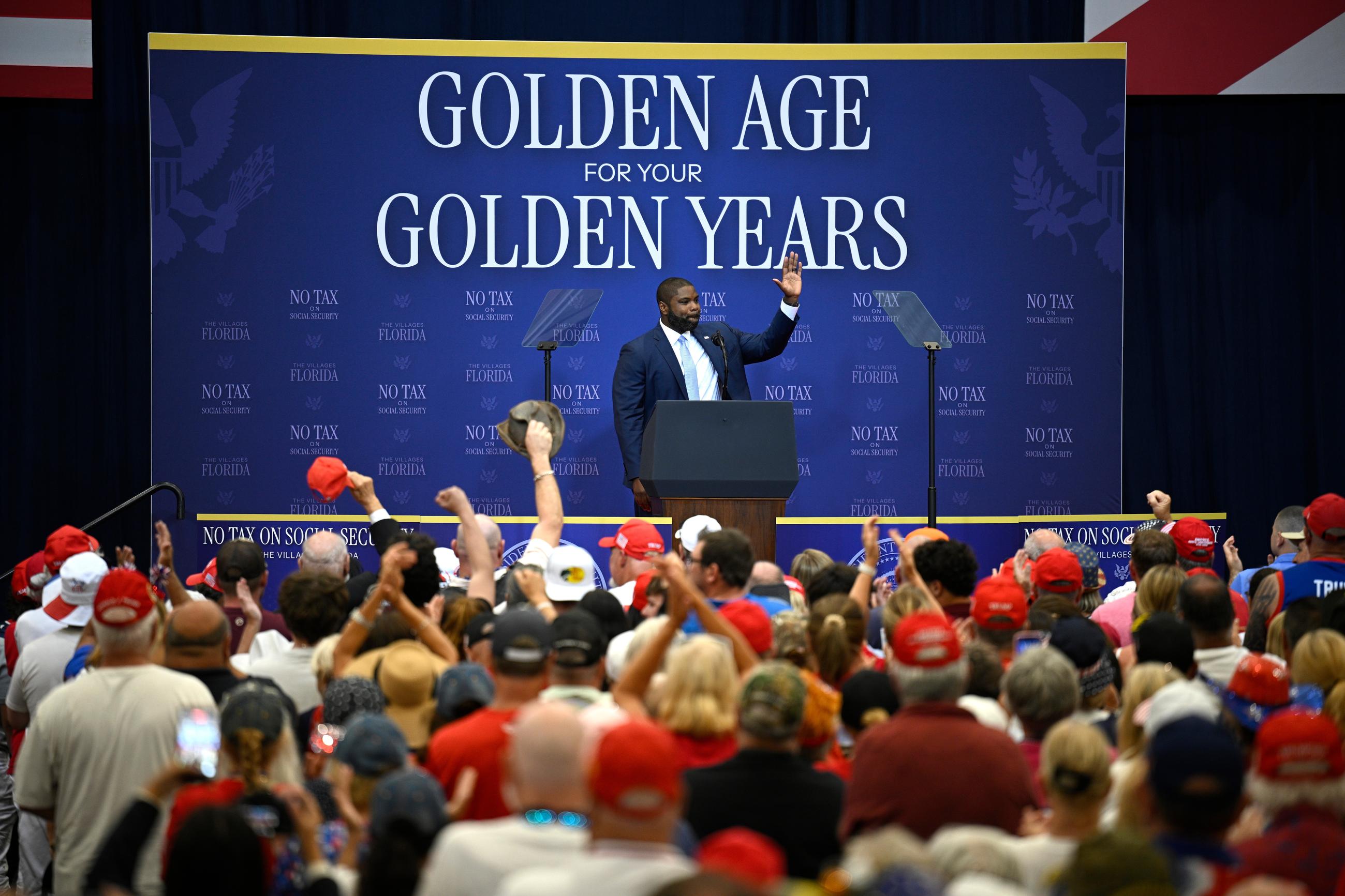 Rep. Byron Donalds, R-Fla., speaks to attendees before a visit by President Donald Trump, Friday, May 1, 2026, in The Villages, Fla. (AP Photo/Phelan M. Ebenhack)