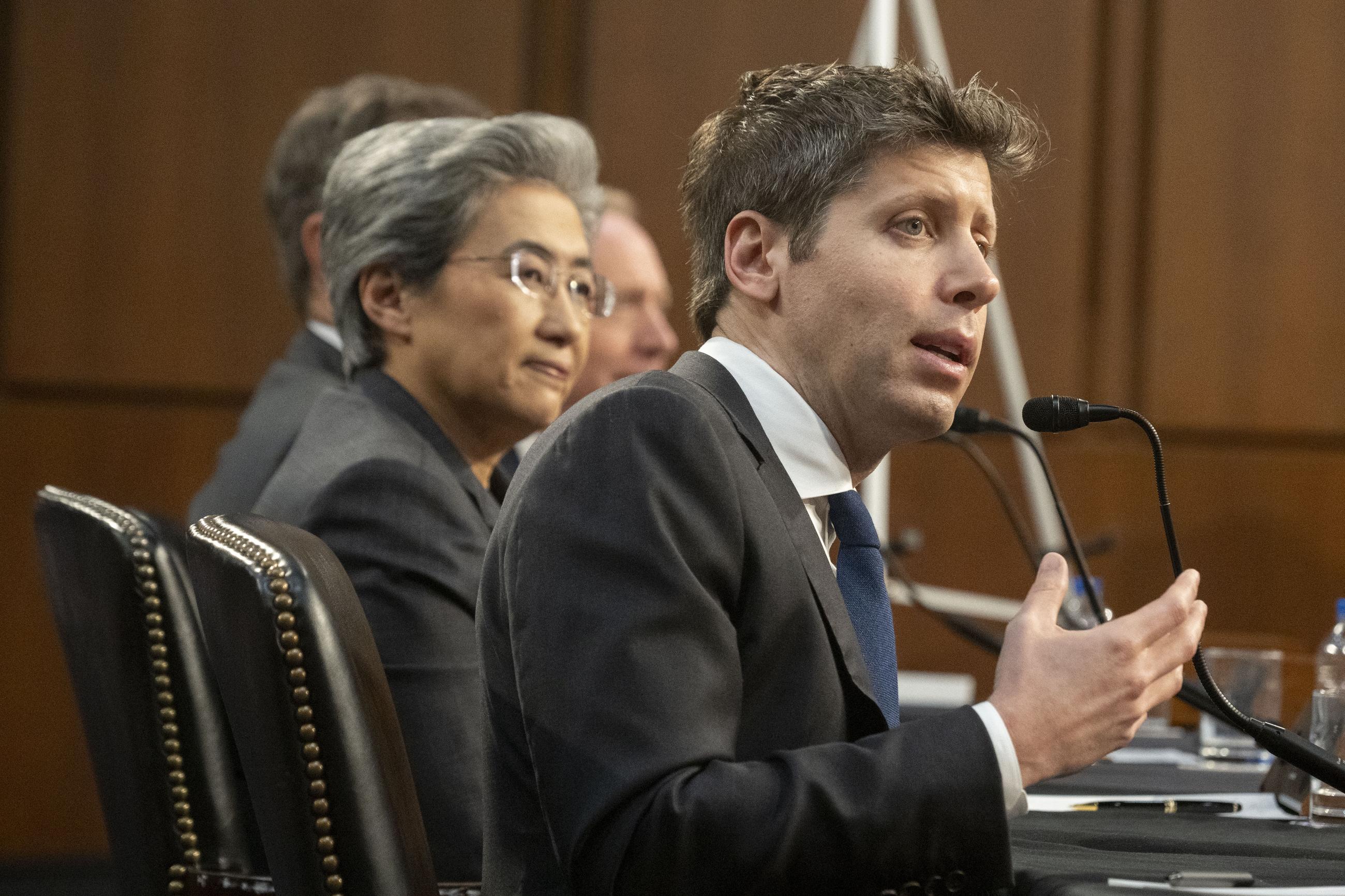 OpenAI CEO Sam Altman testifying at a Senate hearing in May 2025 (AP Photo/Kevin Wolf)