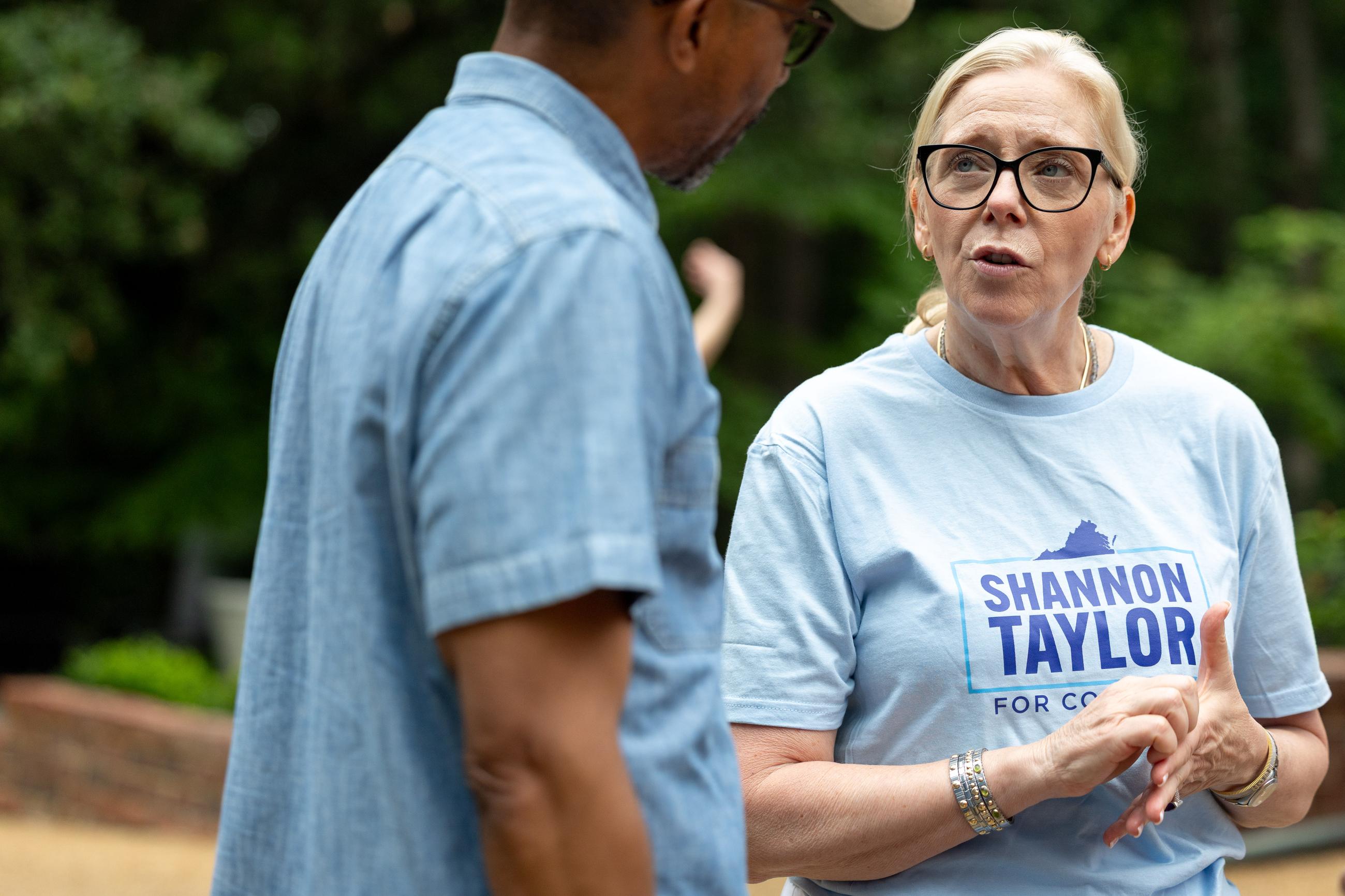 Democratic congressional candidate Shannon Taylor at a door-knocking event in Williamsburg, Va., on July 25 (AP Photo/Mike Kropf)