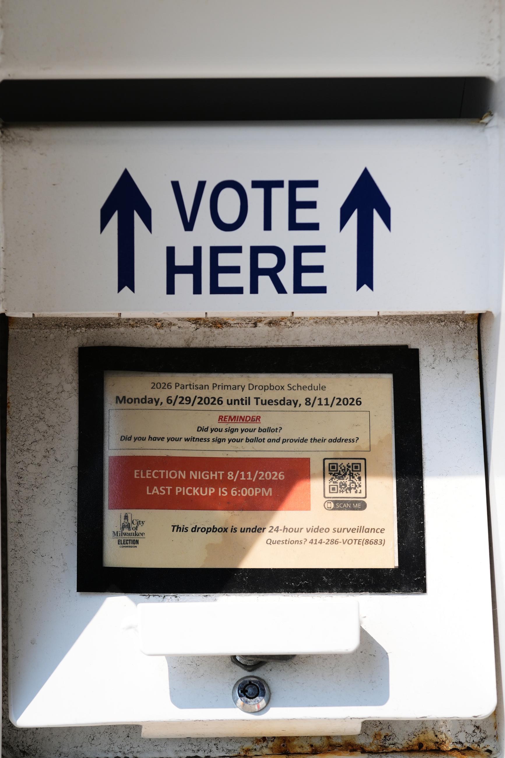 An official ballot drop box outside a polling place in Milwaukee, Tuesday, July 28, 2026. (AP Photo/Nam Y. Huh)