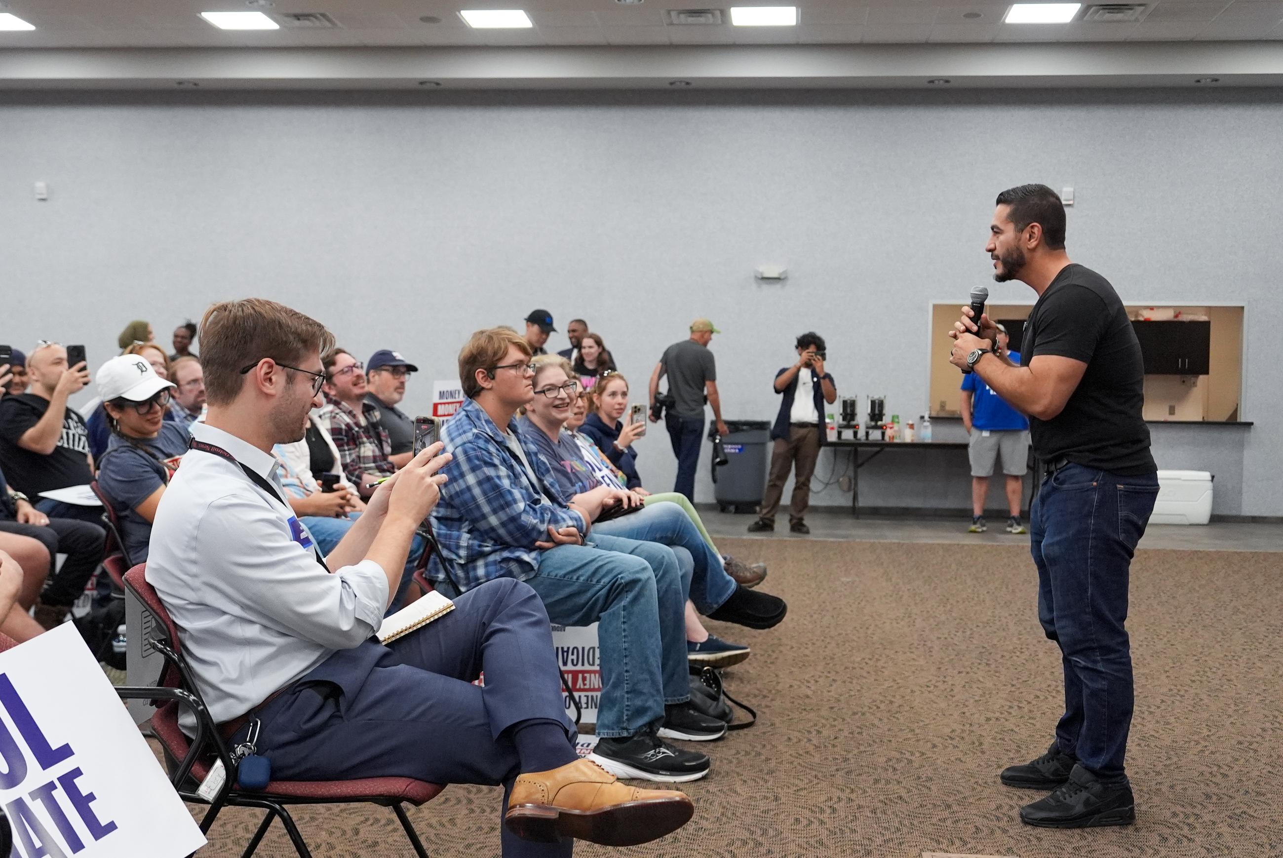 Abdul El-Sayed, a progressive candidate in the Democratic primary for U.S. Senate in Michigan, speaks during a campaign rally at the UAW Region 1 Union Hall, Sunday, Aug. 2, 2026, in Warren, Mich. (AP Photo/Julia Demaree Nikhinson)