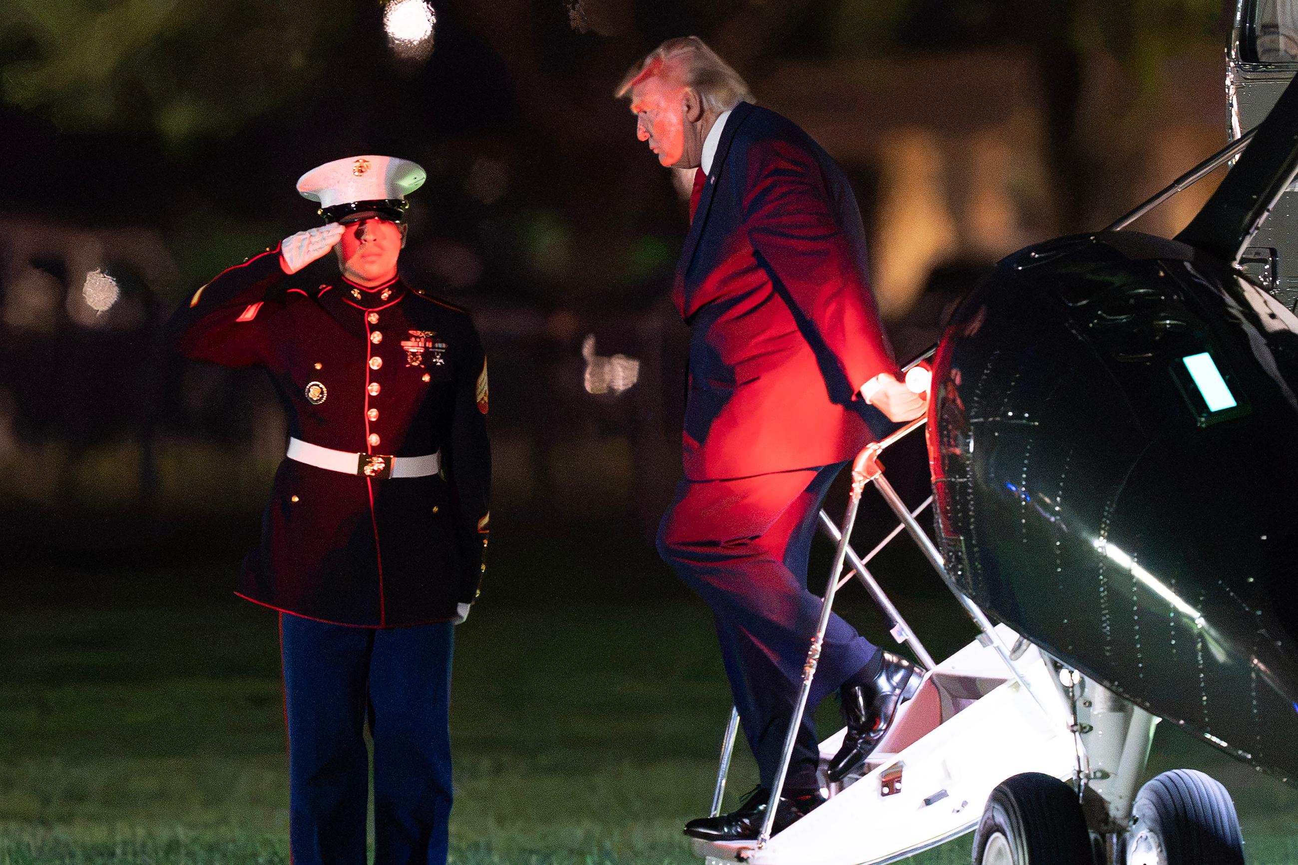President Donald Trump steps off from Marine One upon his arrival at the Ellipse just outside of the White House, Wednesday, Aug. 5, 2026, in Washington. (AP Photo/Jose Luis Magana)