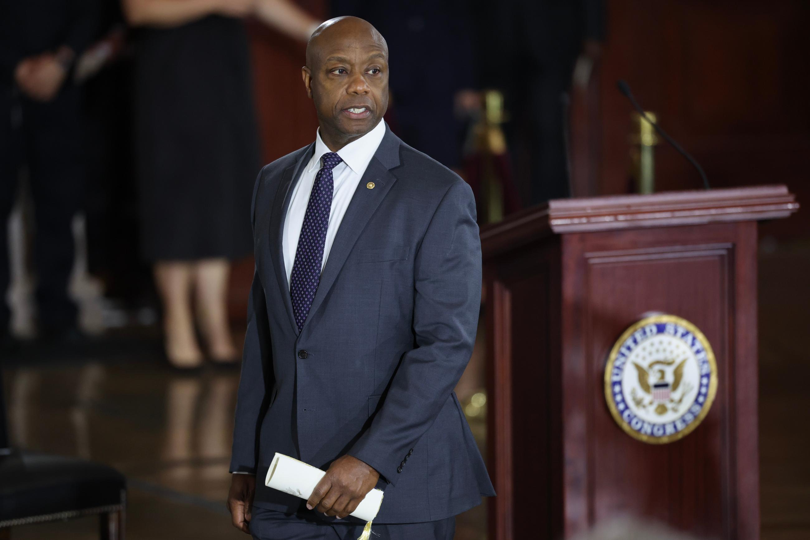 Sen. Tim Scott, R-S.C., pays his respects during a congressional tribute to the late Sen. Lindsey Graham, R-S.C., in the Rotunda of the U.S. Capitol, Tuesday, July 28, 2026, in Washington. (Win McNamee/Pool via AP)