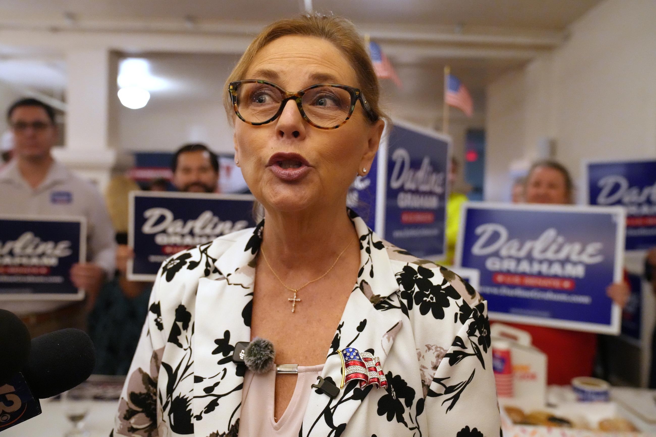 Sen. Darline Graham, R-S.C., speaks with reporters following at a candidate event for hopefuls vying in a special Republican primary to replace her late brother Sen. Lindsey Graham, R-S.C., on November ballots, Saturday, Aug. 8, 2026, in Florence, S.C. (AP Photo/Meg Kinnard)