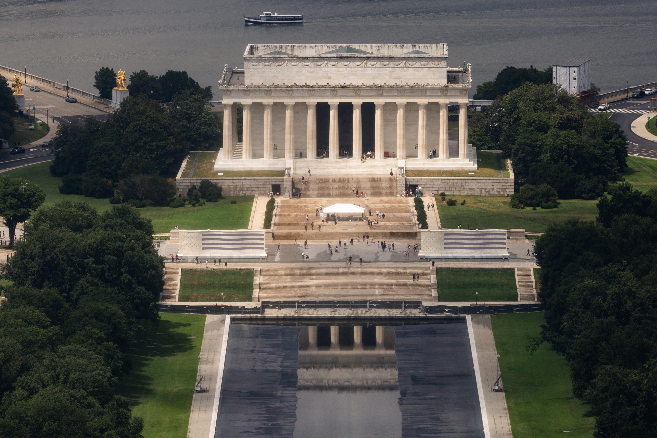 The drained Lincoln Memorial Reflecting Pool is photographed from the Washington Monument, Wednesday, Aug. 5, 2026, in Washington. (AP Photo/Tierney L. Cross)