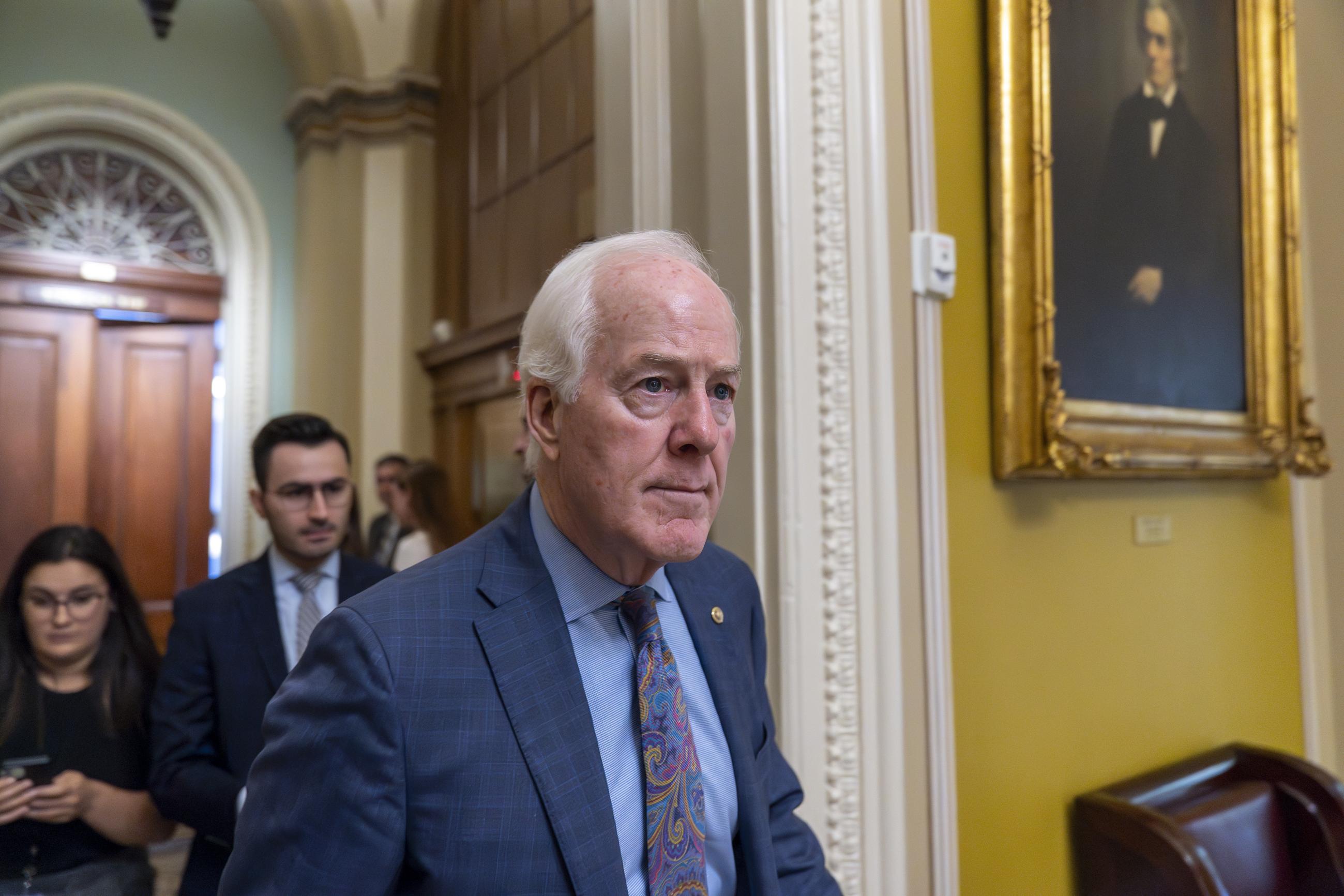 Sen. John Cornyn, R-Texas, departs after a closed-door meeting at the Capitol, Thursday, Sept. 28, 2023, in Washington. (AP Photo/Alex Brandon)
