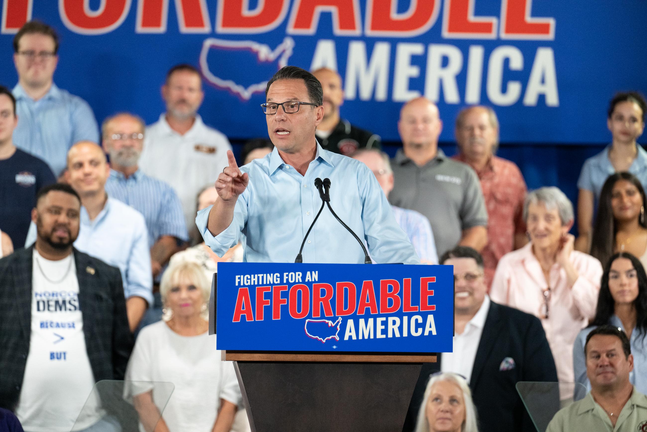 Pennsylvania Gov. Josh Shapiro speaks during an event for Democratic congressional candidate Bob Brooks' campaign at a Steelworkers Union Hall in Bethlehem, Pa., on July 26. (AP Photo/Erin Blewett)