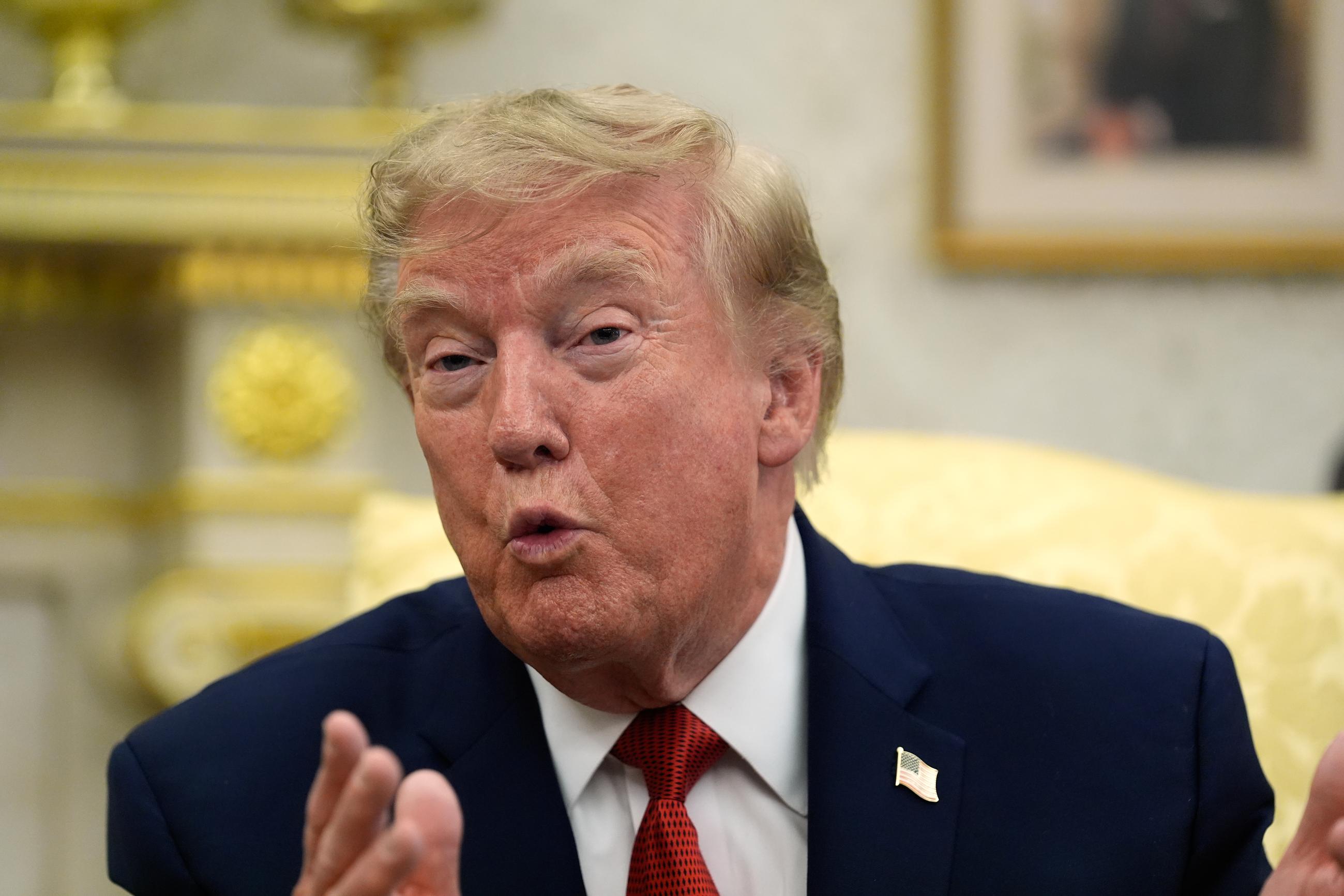 President Donald Trump speaks as he meets with lifeguard Ryder Williams in the Oval Office of the White House, Monday, Aug. 17, 2026, in Washington. (AP Photo/Manuel Balce Ceneta)