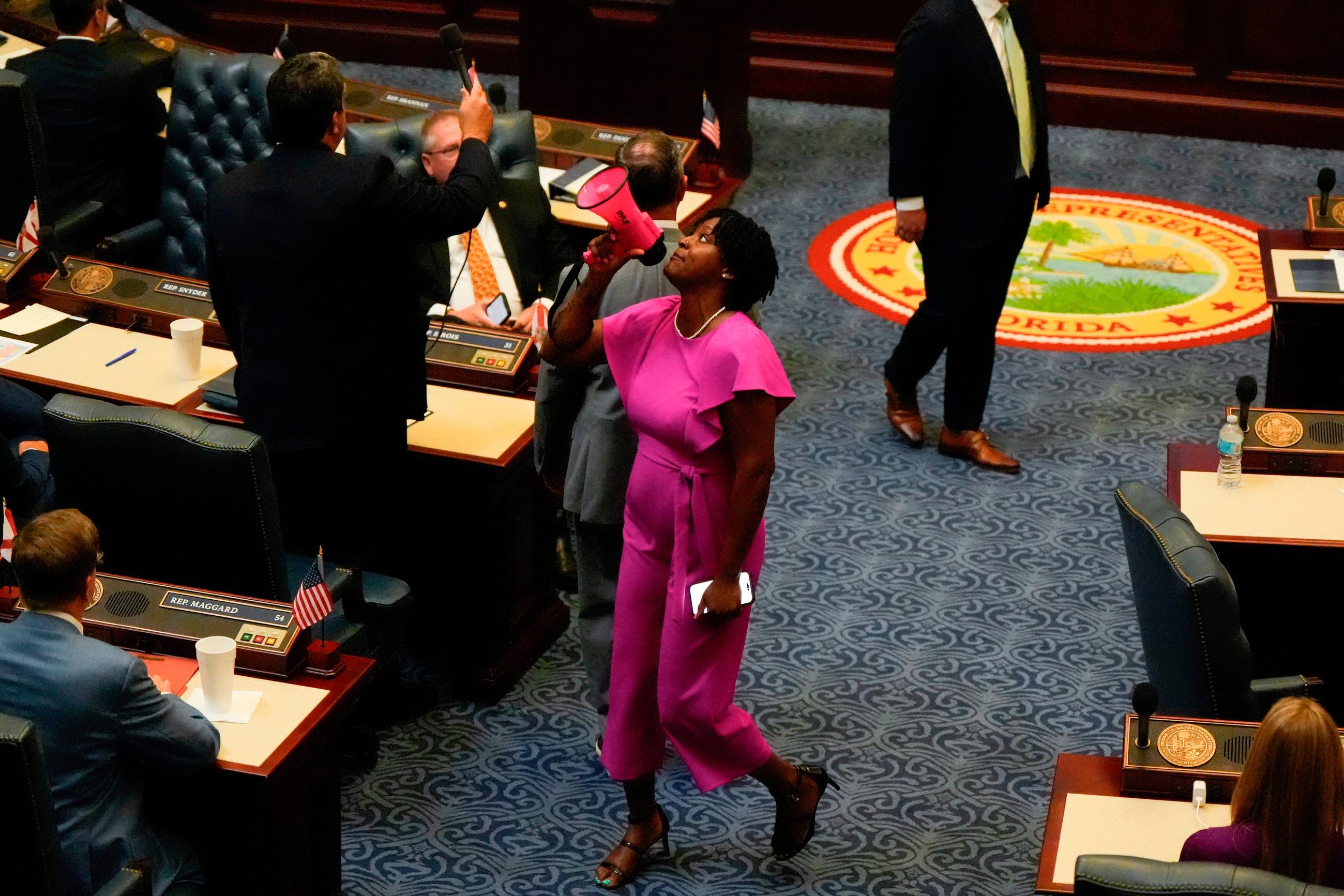 FILE - State Rep. Angie Nixon, D-Fla., speaks loudly on the House floor as the House votes on HB1D, a redistricting bill, during a special session of the Florida Legislature, April 29, 2026, in Tallahassee, Fla. (AP Photo/Mike Stewart, File)
