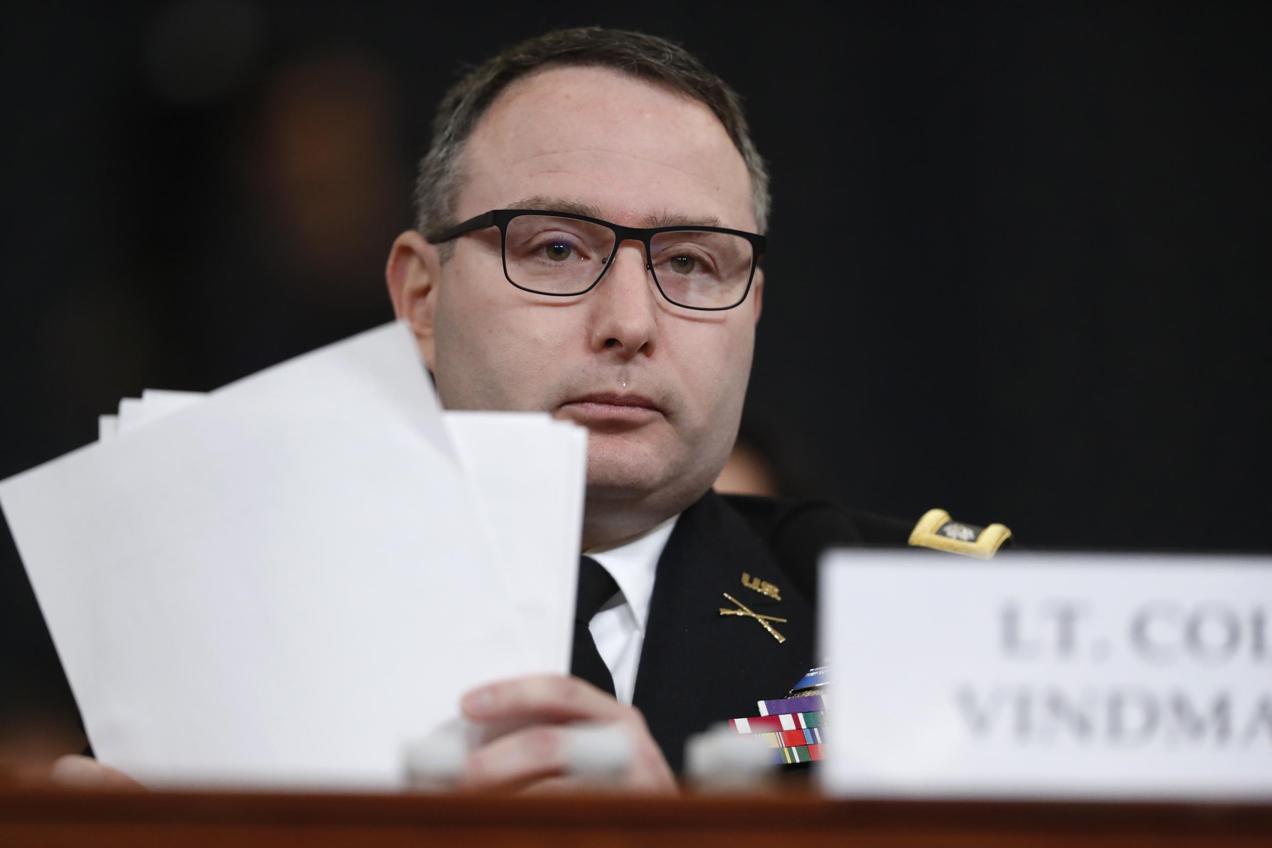 National Security Council aide Lt. Col. Alexander Vindman testifies before the House Intelligence Committee on Capitol Hill in Washington, Tuesday, Nov. 19, 2019, during a public impeachment hearing of President Donald Trump's efforts to tie U.S. aid for Ukraine to investigations of his political opponents. (AP Photo/Andrew Harnik)