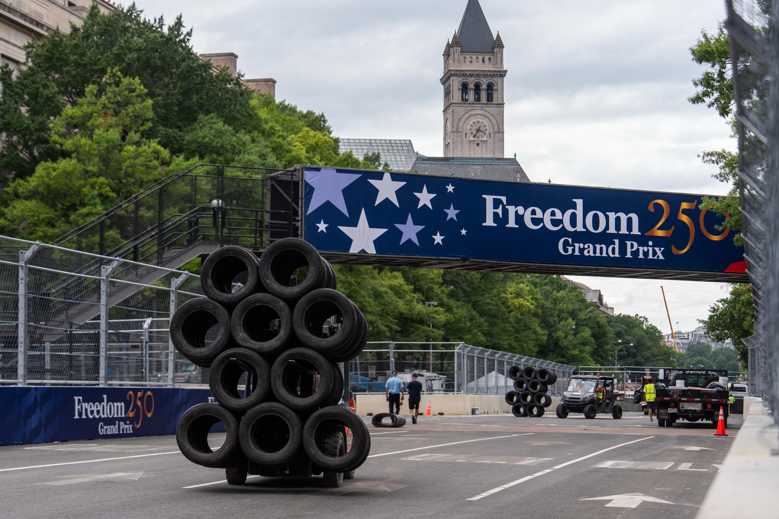Tires are moved around the Freedom 250 Grand Prix race track in Washington on Tuesday. (AP Photo/Julia Demaree Nikhinson)