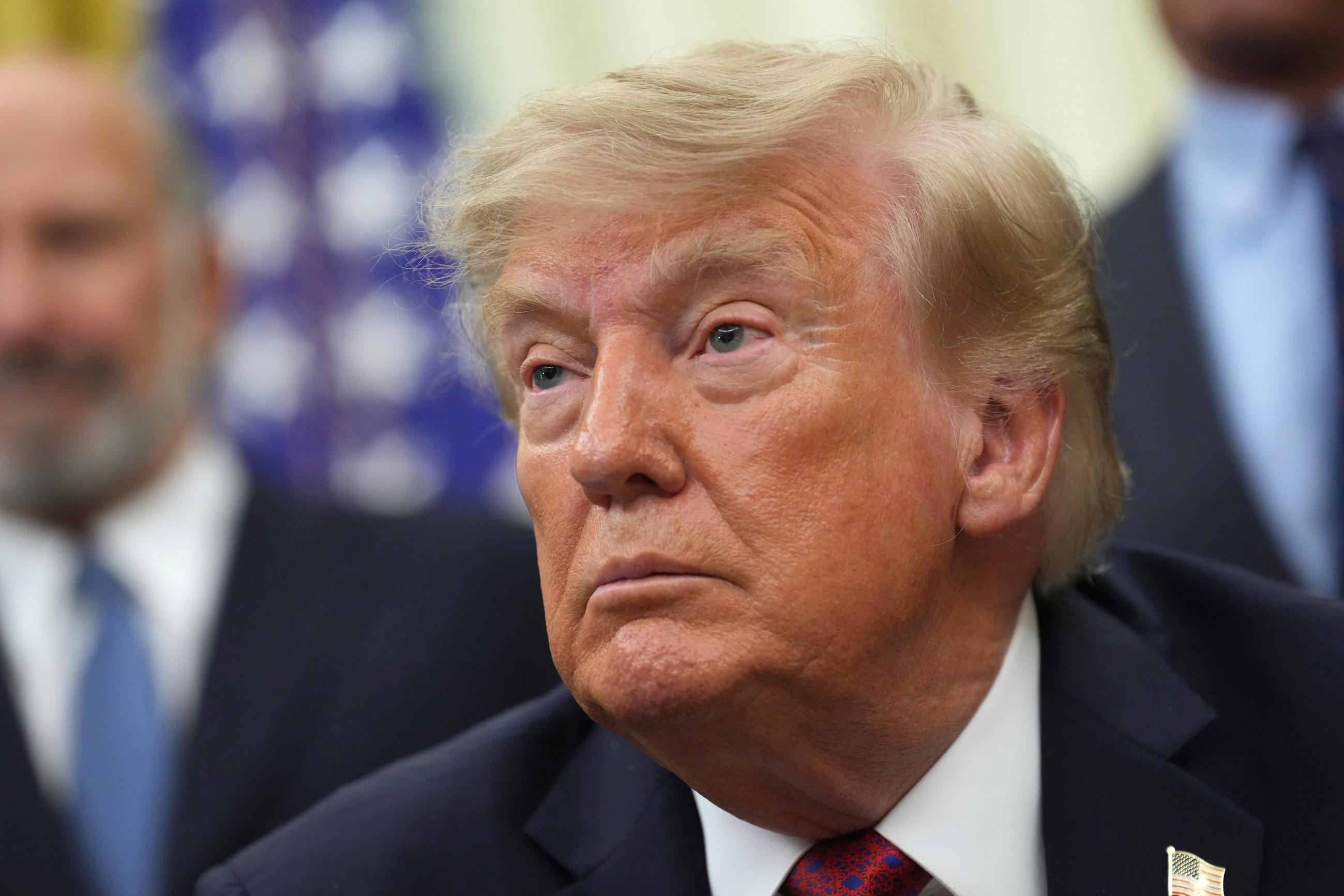 President Donald Trump listens as a reporter asks a question in the Oval Office of the White House, Monday, Aug. 31, 2026, in Washington. (AP Photo/Jacquelyn Martin)