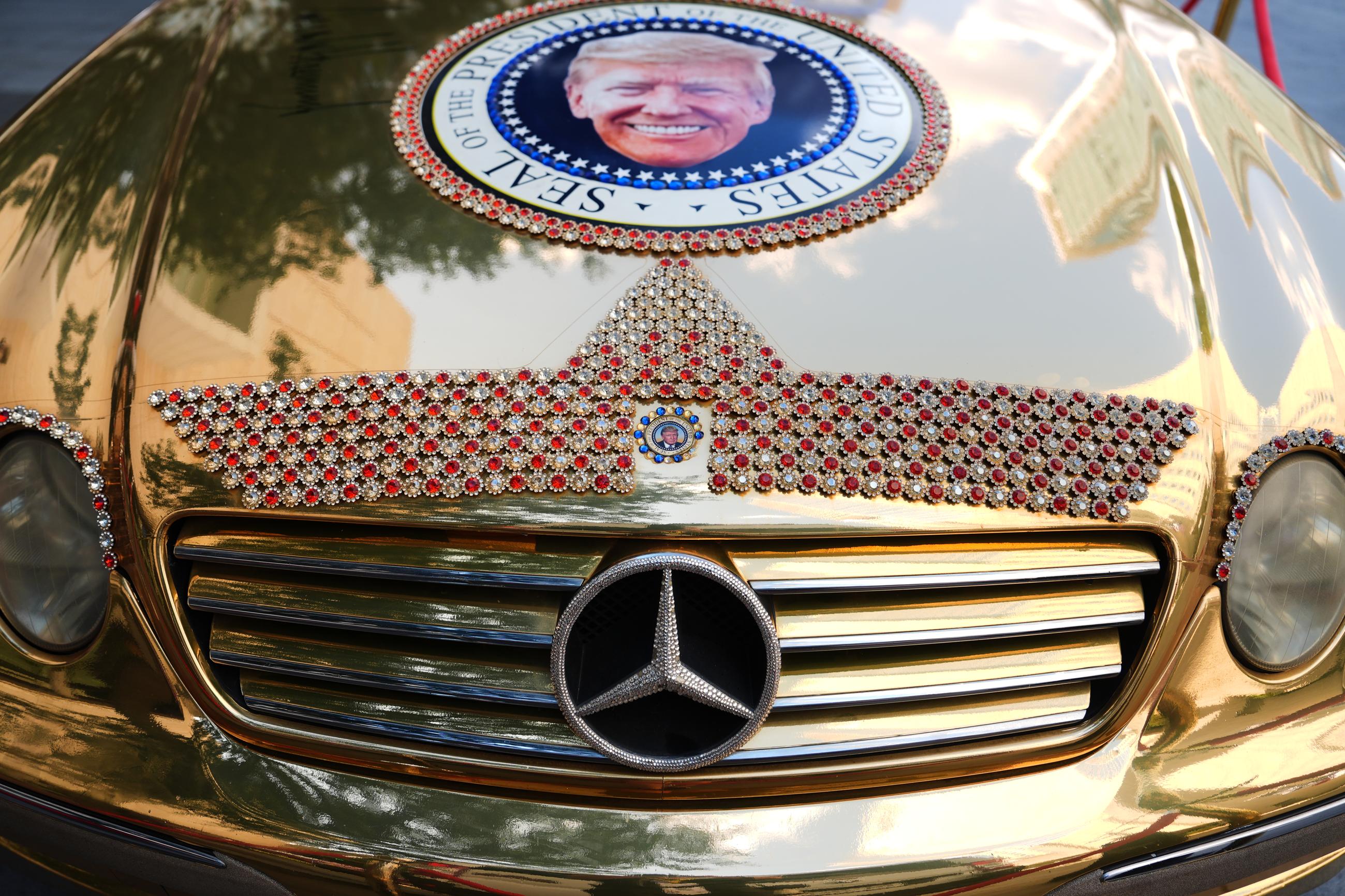 A Mercedes decorated with images of President Trump is seen outside Tuesday ahead of the Republican convention in Dallas. (AP Photo/Julia Demaree Nikhinson)