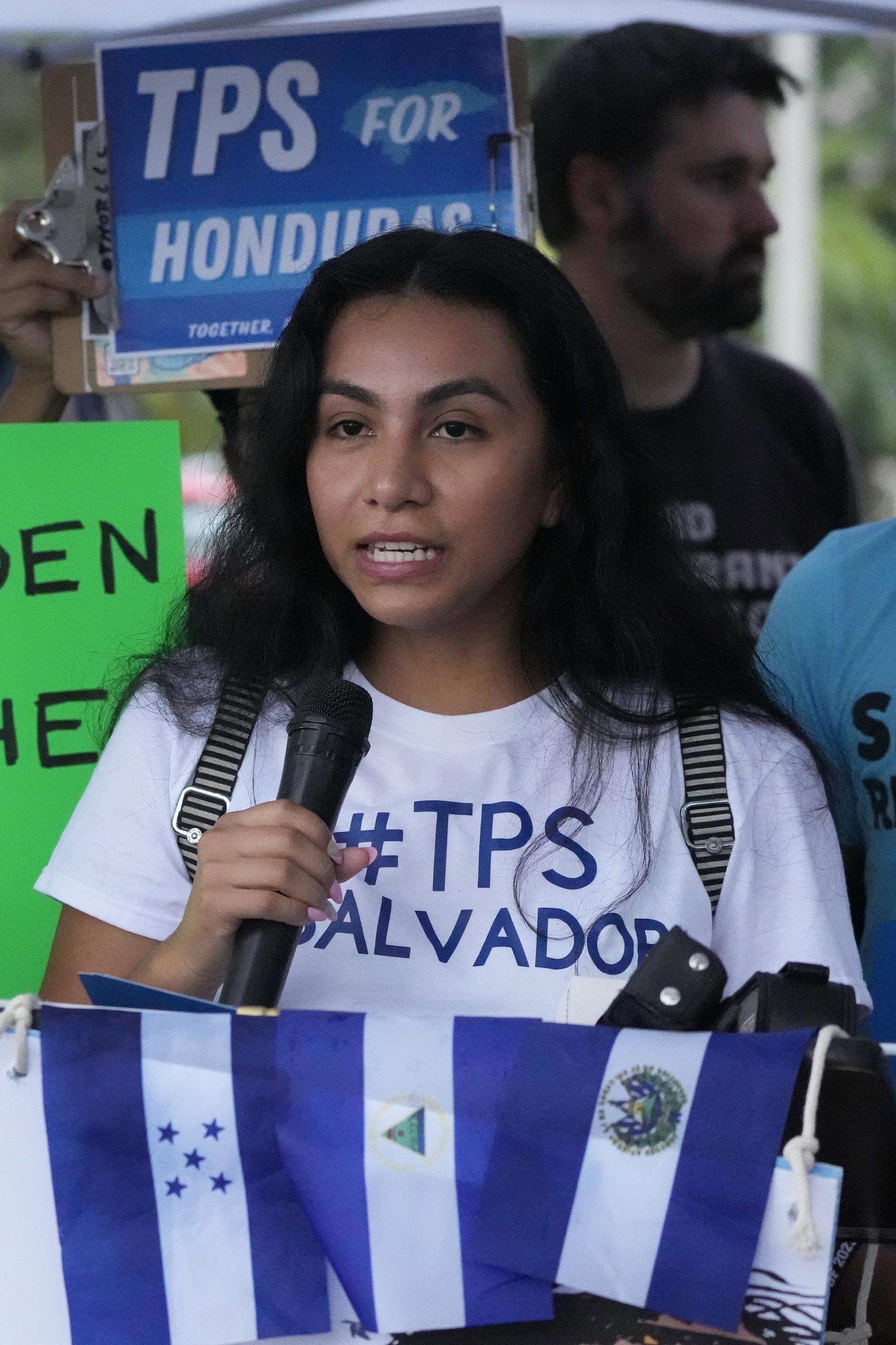 Idalia Quinteros speaks during a news conference calling for a new designation of Temporary Protected Status for migrants from Nicaragua, El Salvador, and Honduras in front of Immigration and Customs Enforcement offices in Miramar, Fla., in 2023. (AP Photo/Wilfredo Lee)
