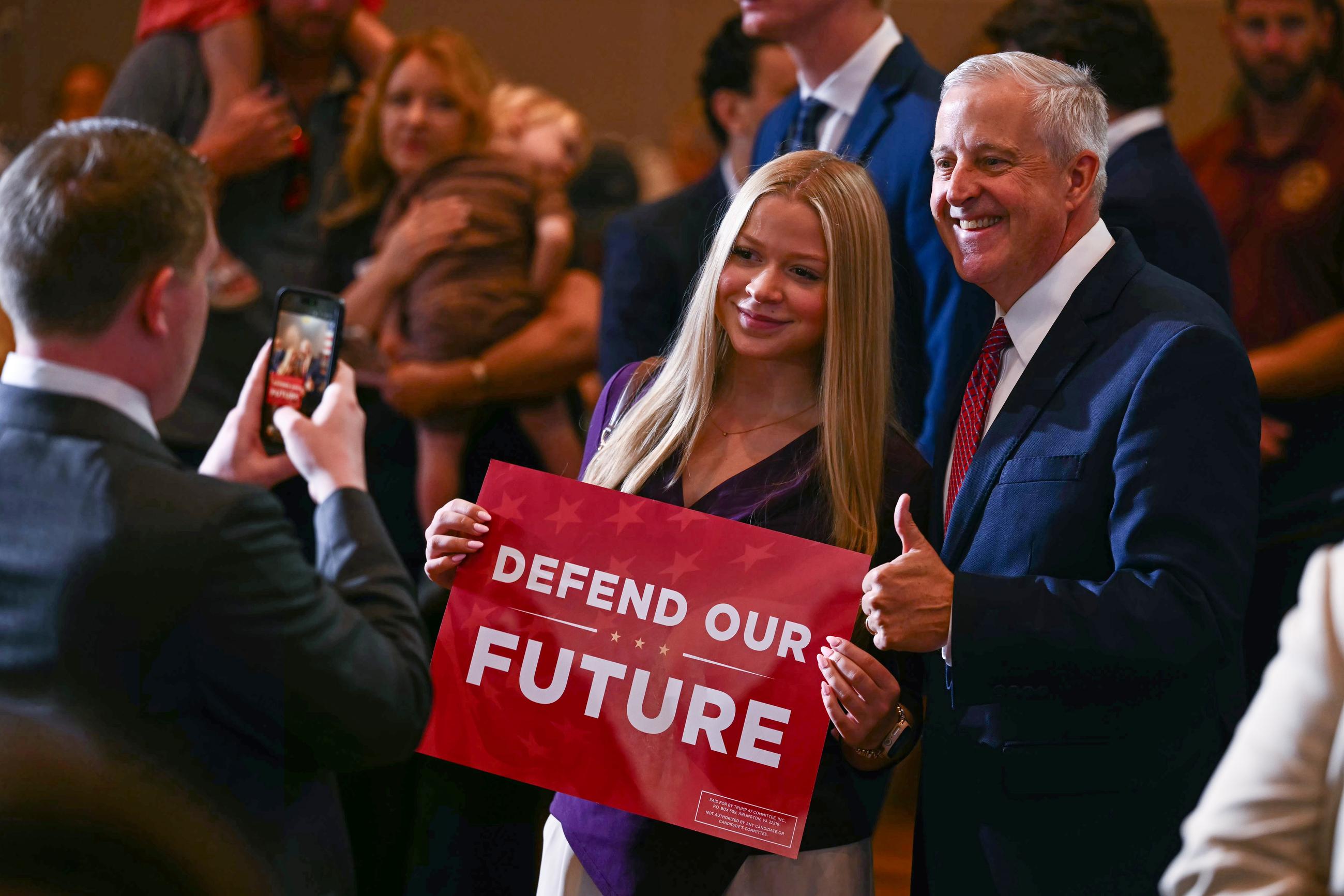 Republican Senate candidate Michael Whatley, right, greets attendees before Vice President JD Vance arrives at a rally at Koury Convention Center in Greensboro, N.C., Monday, Sept. 21, 2026. (Kent Nishimura/Pool Photo via AP)