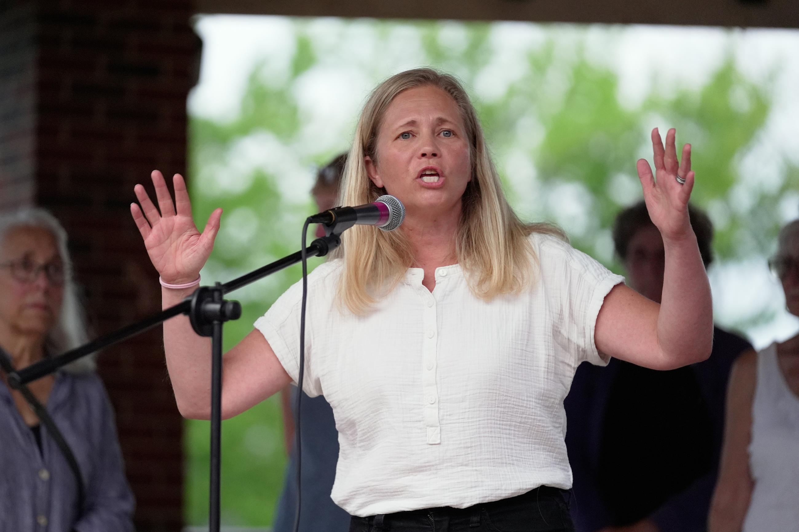 Democratic gubernatorial candidate Hannah Pingree speaks at a vigil in Biddeford, Maine, on July 13, after a man was shot and killed by Immigration and Customs Enforcement. (AP Photo/Robert F. Bukaty)