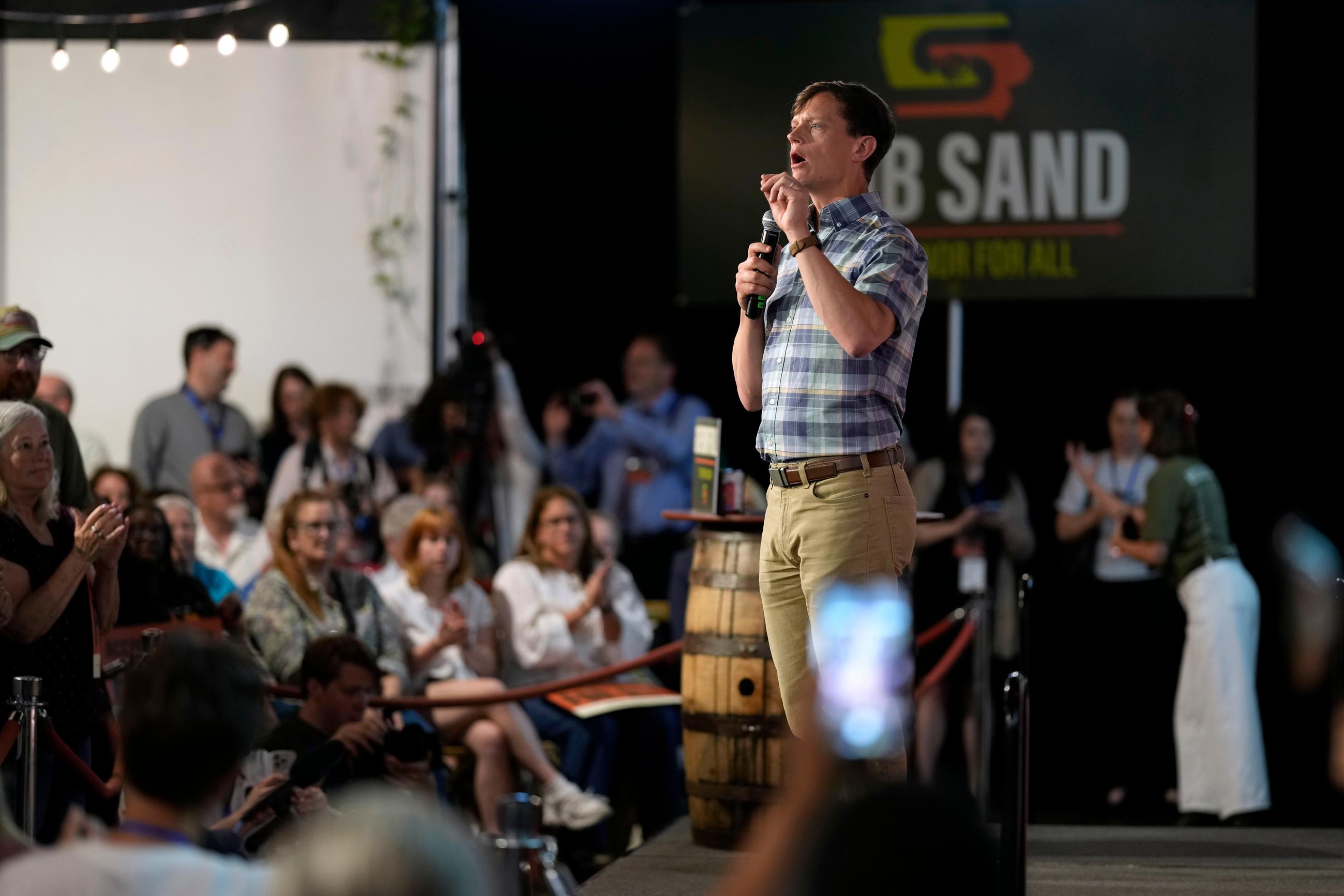 Iowa Democratic gubernatorial candidate Rob Sand speaks during a campaign rally, Sunday, June 7, 2026, in Des Moines, Iowa. (AP Photo/Charlie Neibergall)