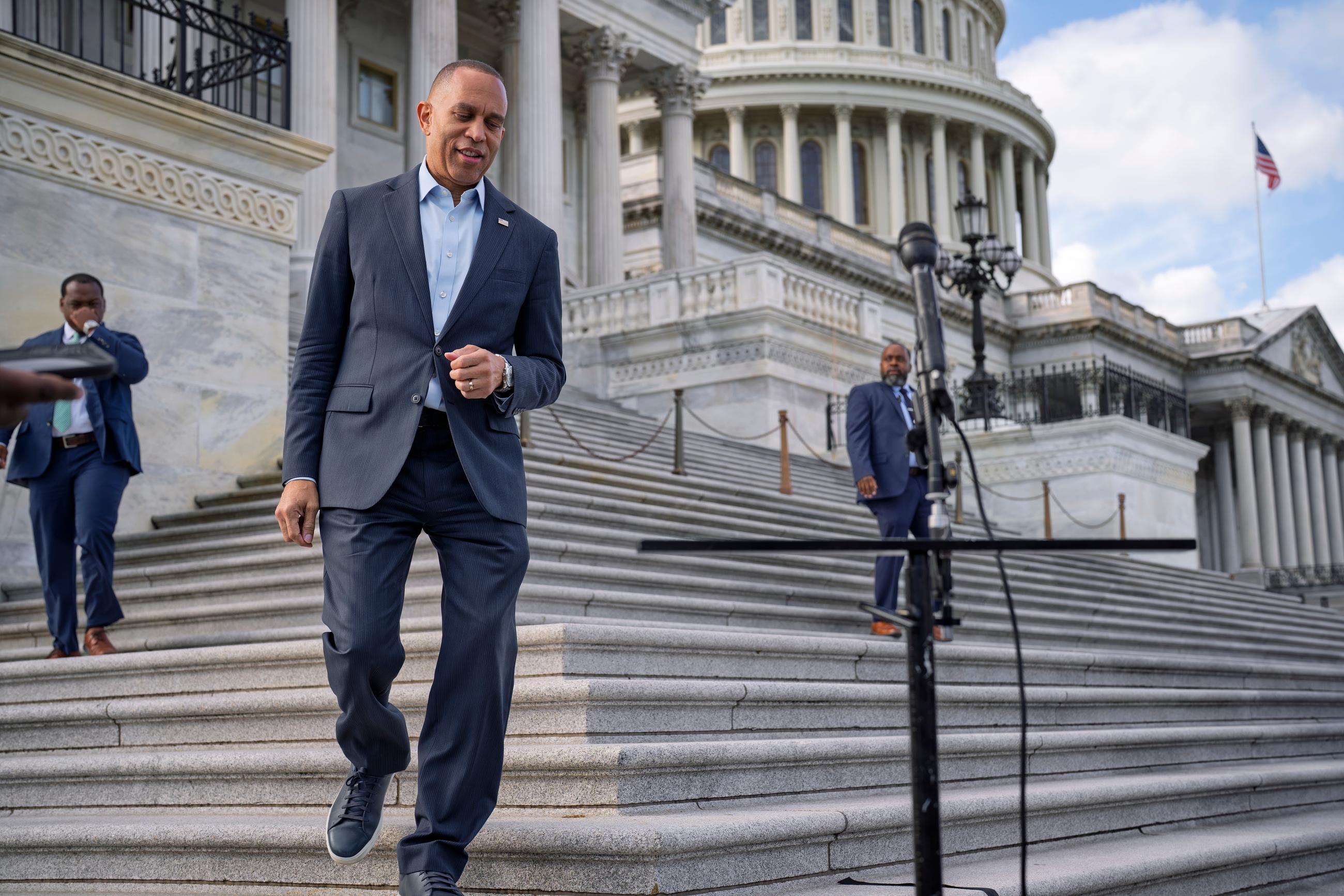 House Democratic Leader Hakeem Jeffries of New York, who is in line to become speaker if the Republicans lose their majority, arrives to speak with reporters to repeat his pledge of a robust oversight agenda of President Donald Trump's government if his party sweeps control in the November elections, at the Capitol in Washington, Wednesday, Sept. 30, 2026. (AP Photo/J. Scott Applewhite)