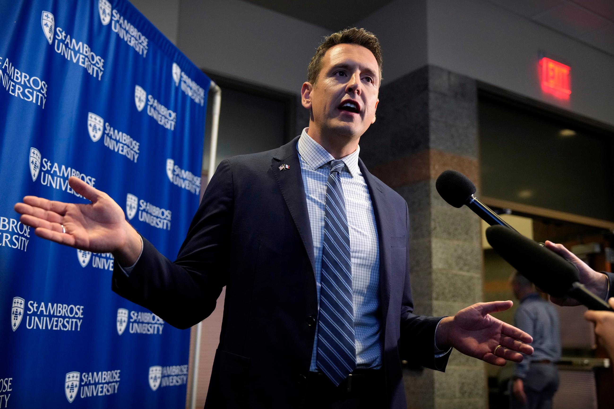 Republican gubernatorial candidate Zach Lahn speaks to the media after a debate hosted by KWQC, Tuesday, Oct. 6, 2026, at St. Ambrose University in Davenport, Iowa. (AP Photo/Charlie Neibergall)