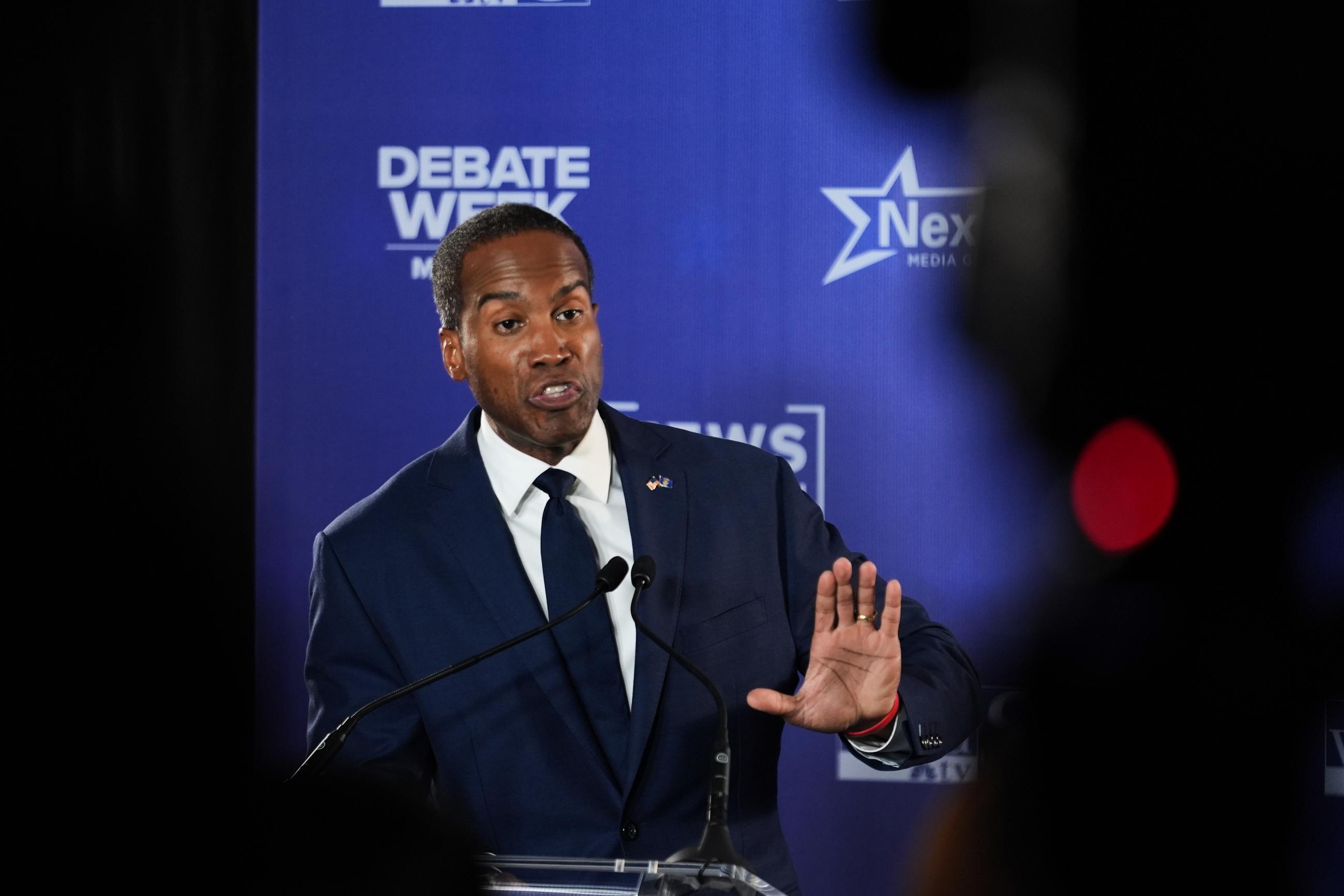 Rep. John James, R-Mich, Republican gubernatorial candidate talks to the media after a televised debate with Democratic gubernatorial nominee and Michigan Secretary of State Jocelyn Benson, on Tuesday, Oct. 6, 2026, at WOOD-TV, in Grand Rapids, Mich. (AP Photo/Paul Sancya)
