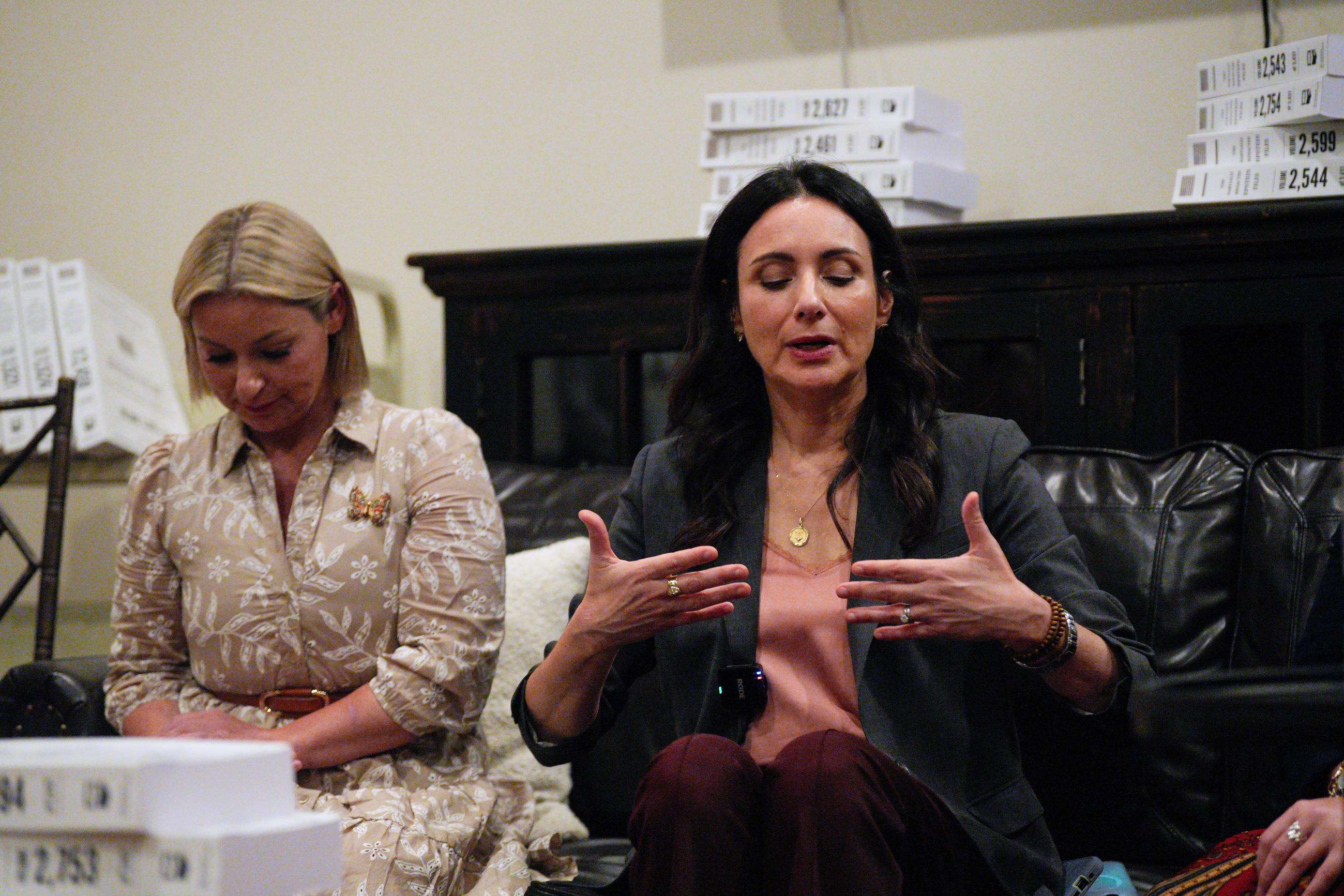 Texas state Rep. and Gina Hinojosa, right, meets with Epstein survivors Liz Stein, Dani Bensky and Lara Blume McGee, along with Amanda Roberts and Sky Roberts, family members of Epstein survivor Virginia Giuffre, at the Donald J. Trump and Jeffrey Epstein Memorial Reading Room in Dallas, Wednesday, Sept. 9, 2026. (AP Photo/Gabriela Passos)