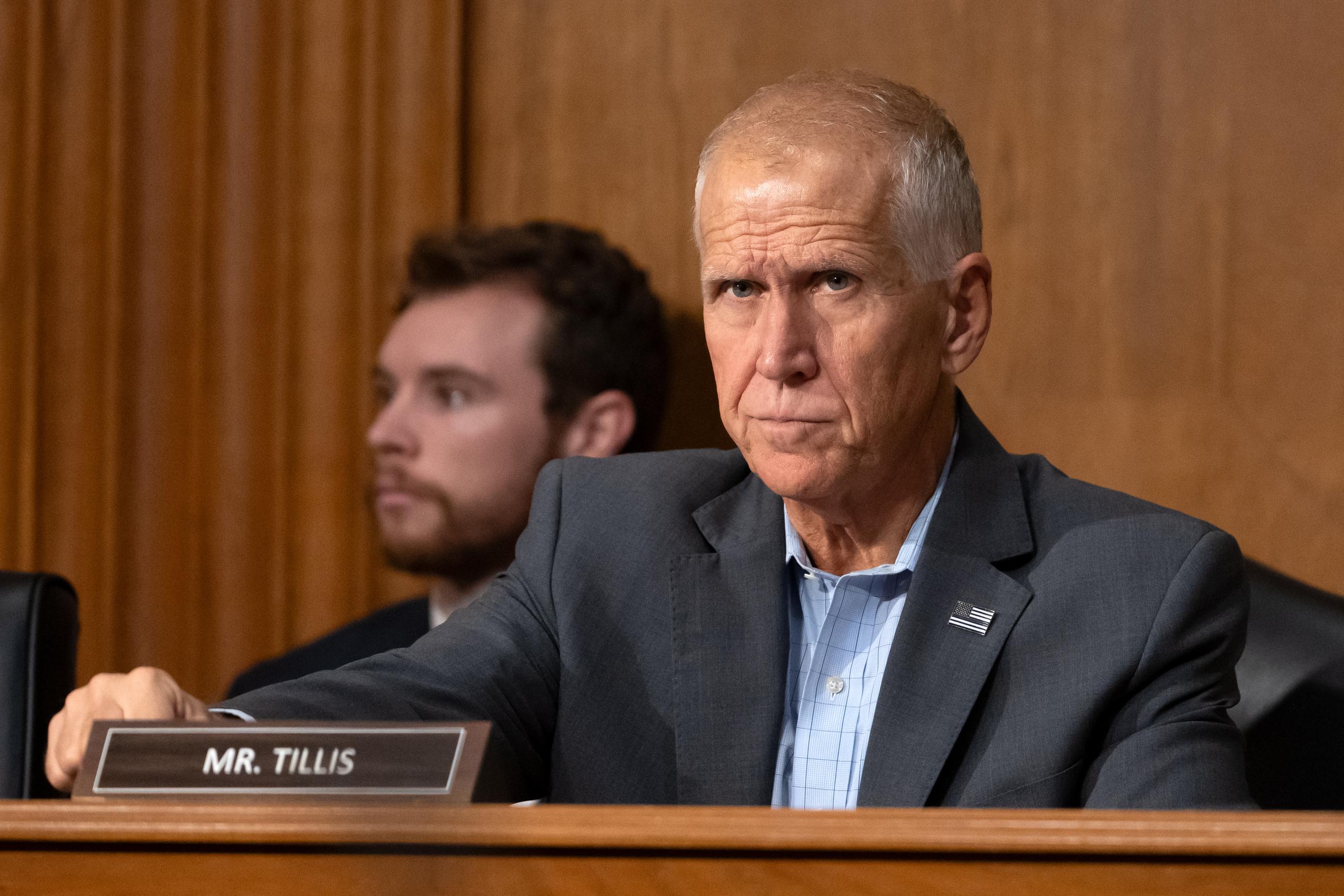 Sen. Thom Tillis arrives for a hearing of the Finance Committee in July. (AP Photo/Mark Schiefelbein)
