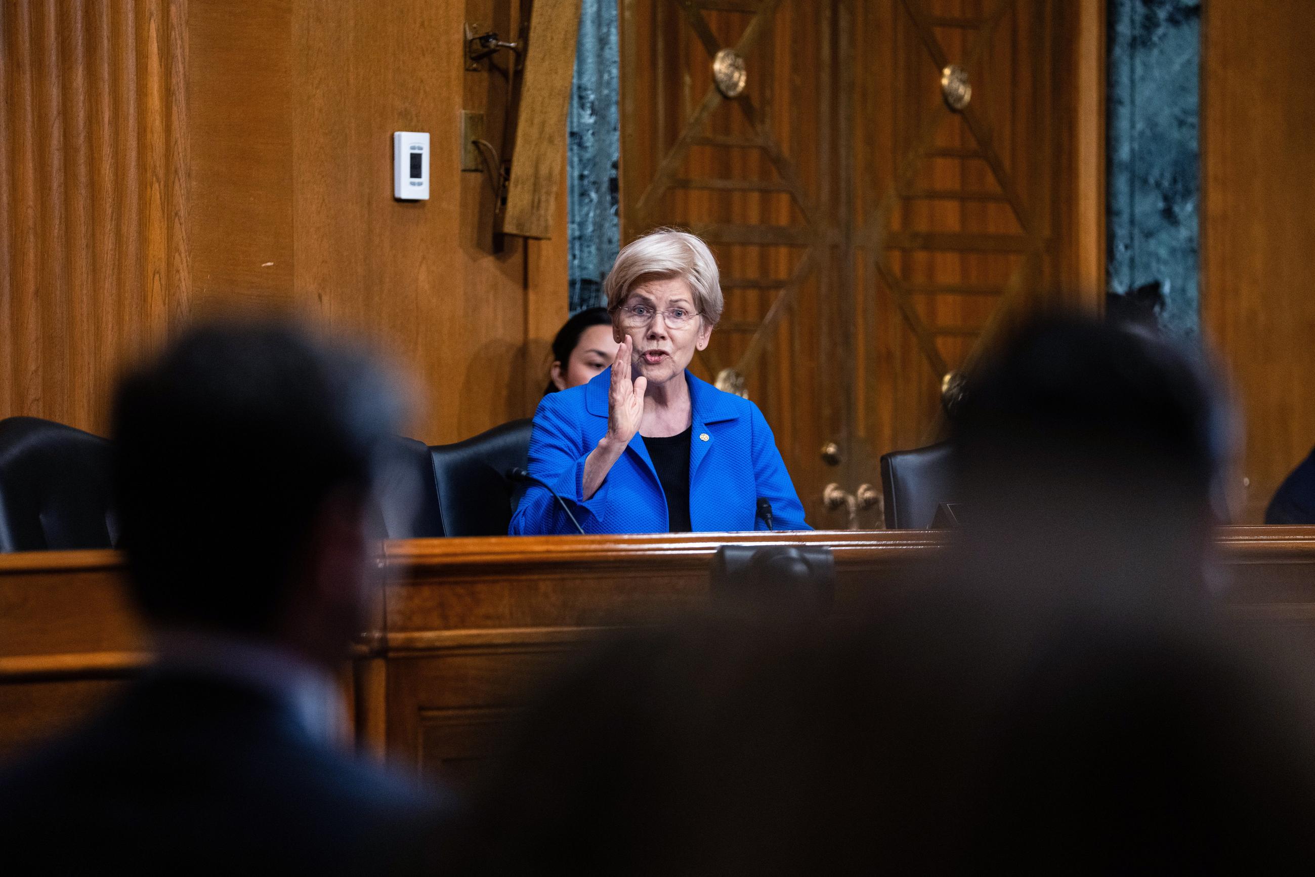 Sen. Elizabeth Warren asks questions during a Senate Finance Committee hearing in June. (AP Photo/Allison Robbert)