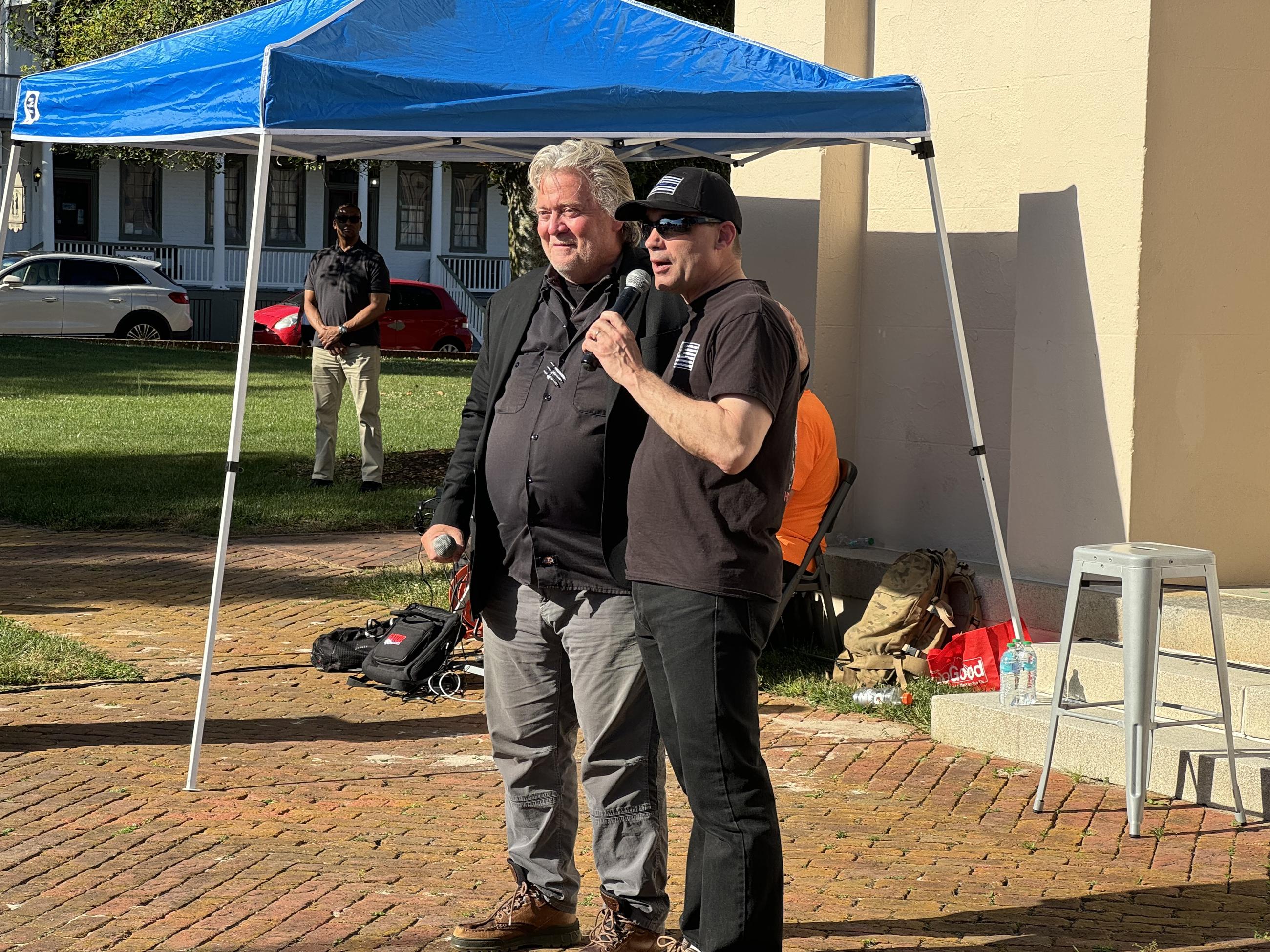 GOP Rep. Bob Good (right) speaks at a campaign rally in Powhatan, Va., on Friday with former Trump White House adviser Steve Bannon. (NJ Photo/Casey Wooten).