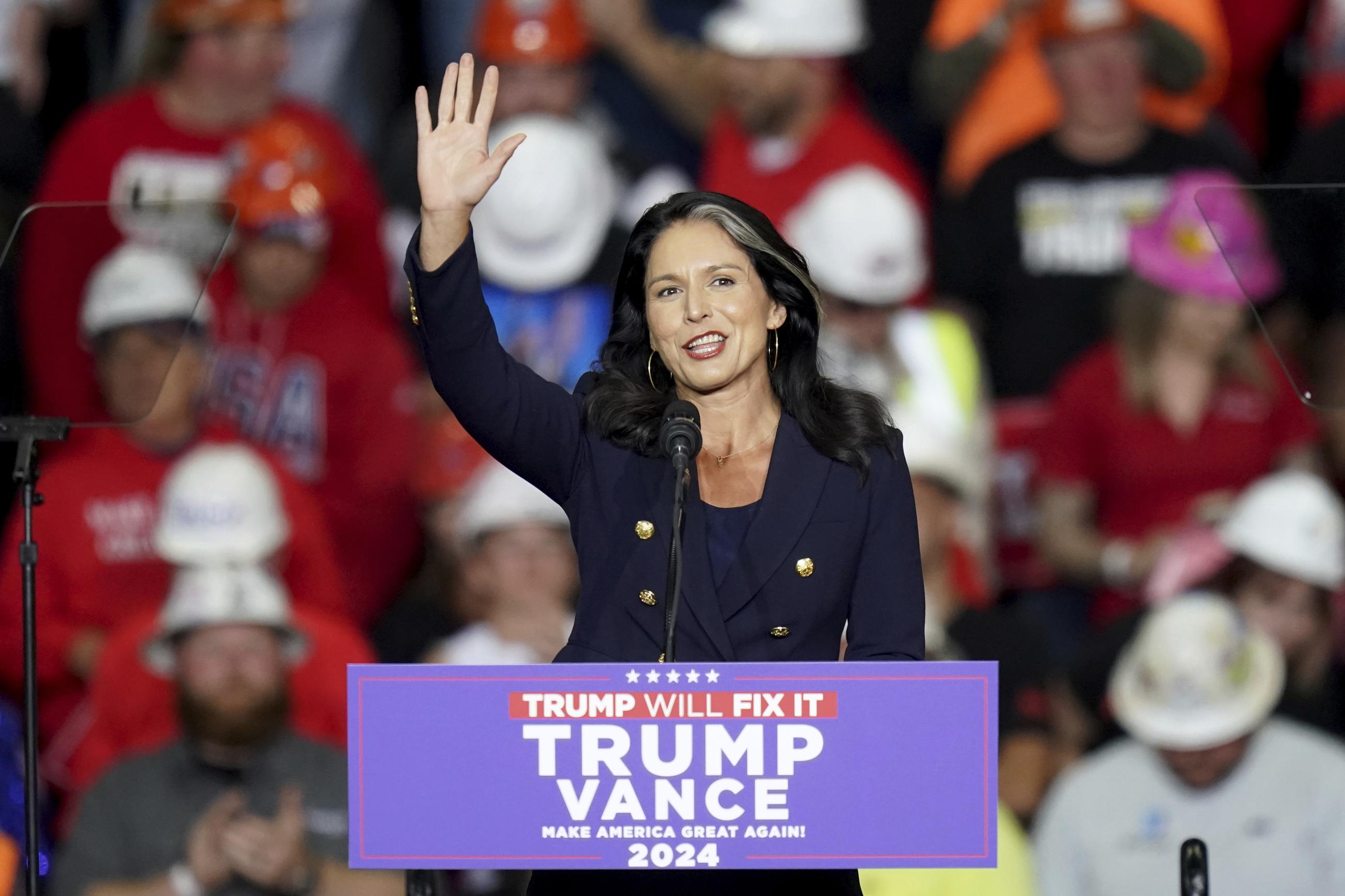 Tulsi Gabbard at a Trump campaign rally. (AP Photo/Matt Freed)