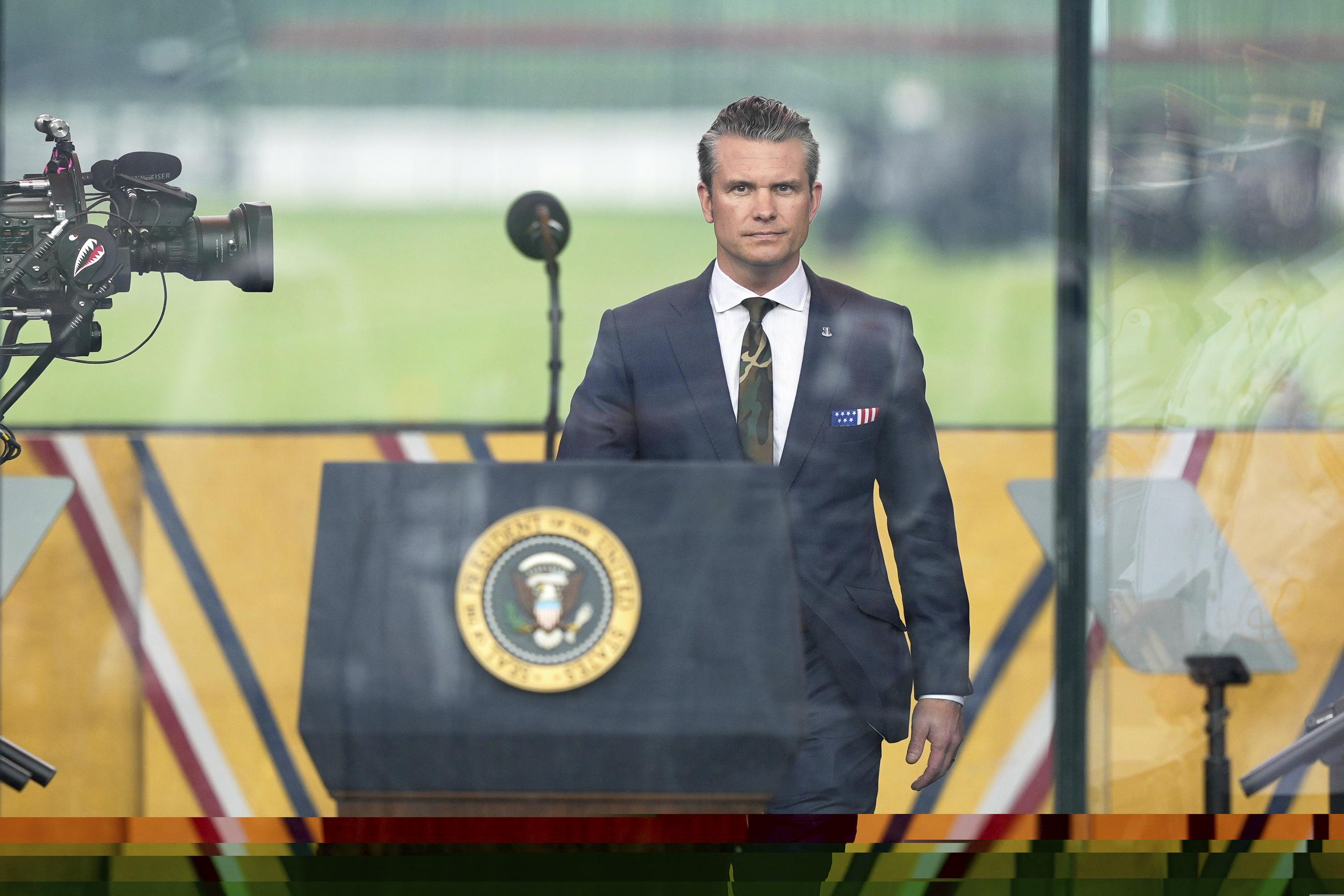 Defense Secretary Pete Hegseth arrives for a military parade commemorating the Army's 250th anniversary, that coincides with President Donald Trump's 79th birthday, Saturday, June 14, 2025, in Washington. (AP Photo/Julia Demaree Nikhinson)